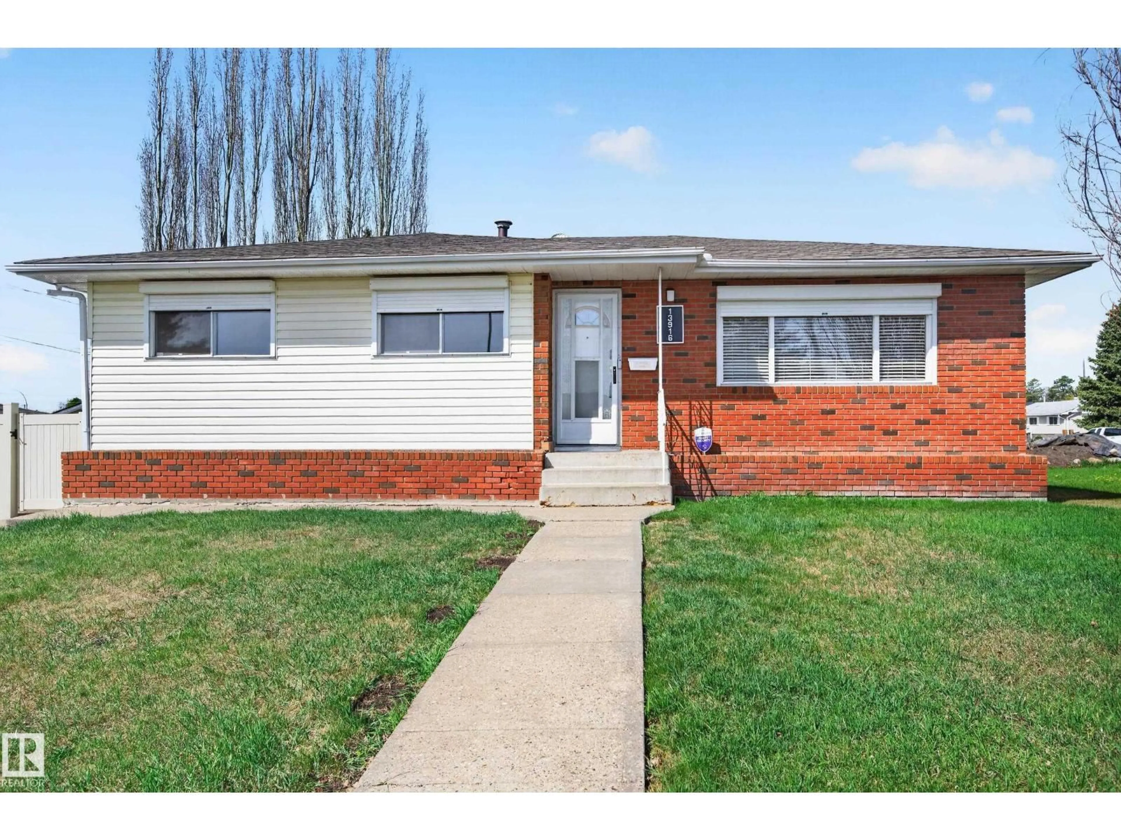 Home with brick exterior material, street for 13916 61 ST NW, Edmonton Alberta T5A1P2