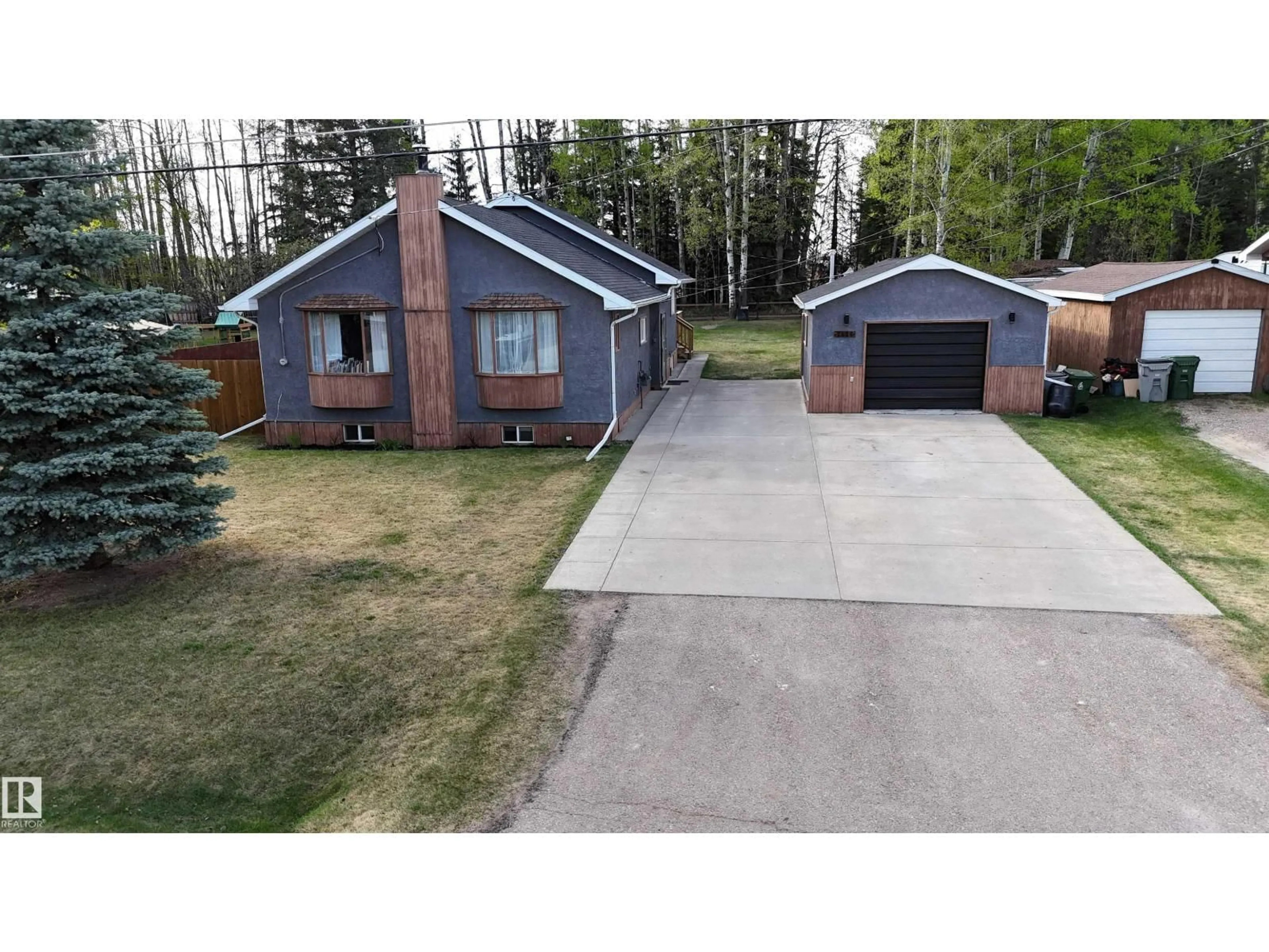 A pic from outside/outdoor area/front of a property/back of a property/a pic from drone, street for 7126 4A AVE, Edson Alberta T7E1N3