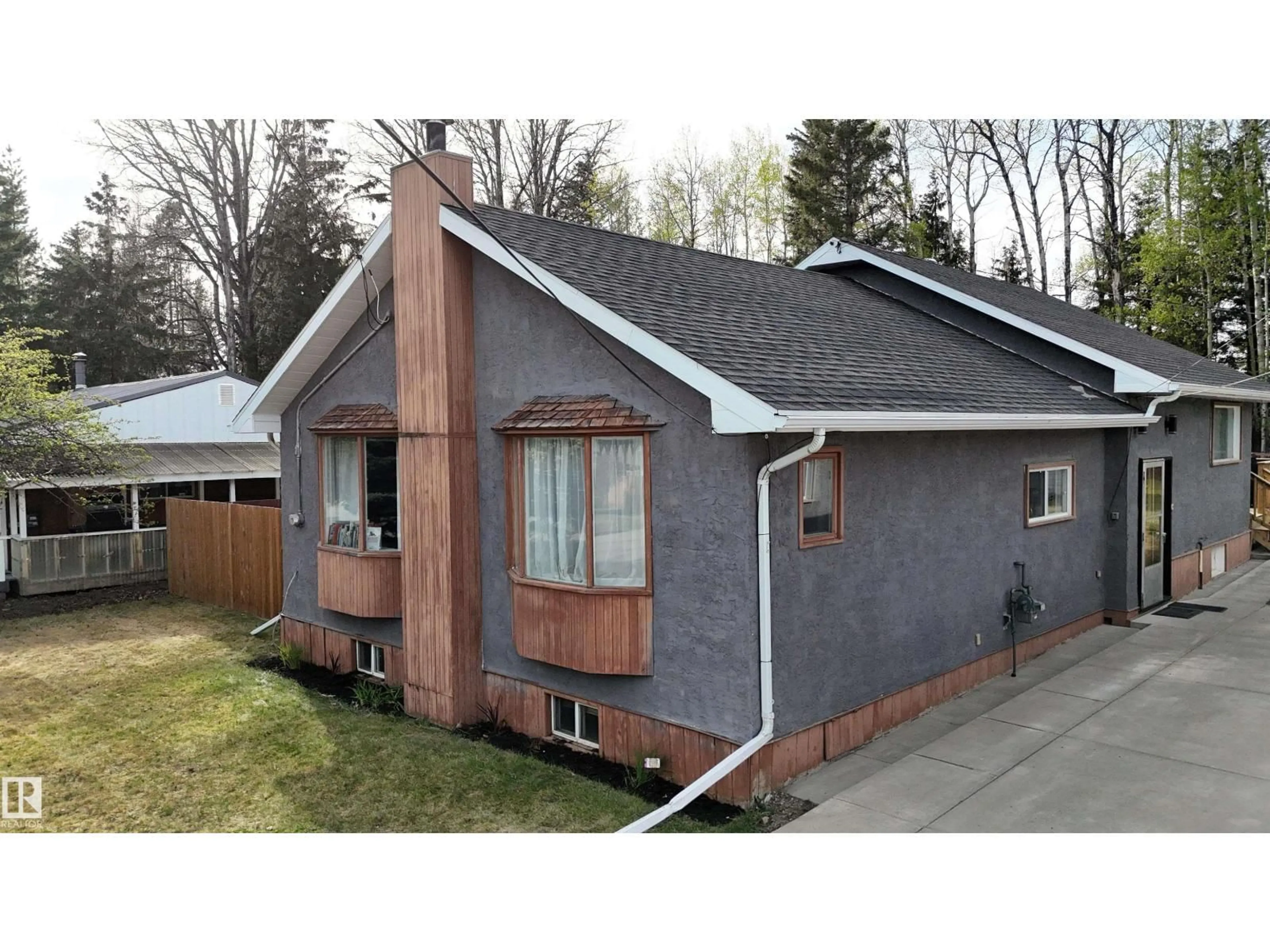 Home with vinyl exterior material, street for 7126 4A AVE, Edson Alberta T7E1N3
