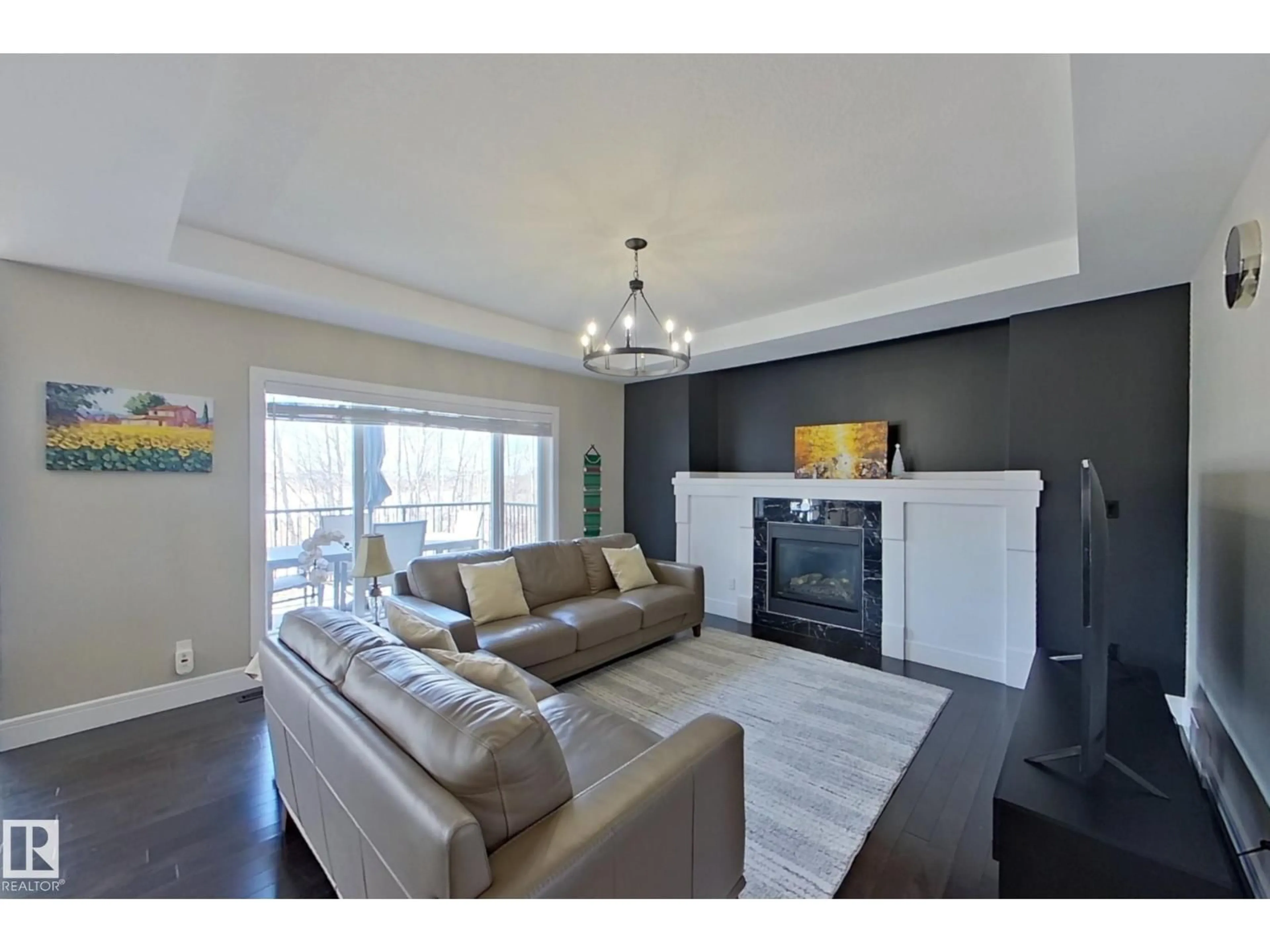 Living room with furniture, wood/laminate floor for 5512 64 ST, Beaumont Alberta T4X0H1