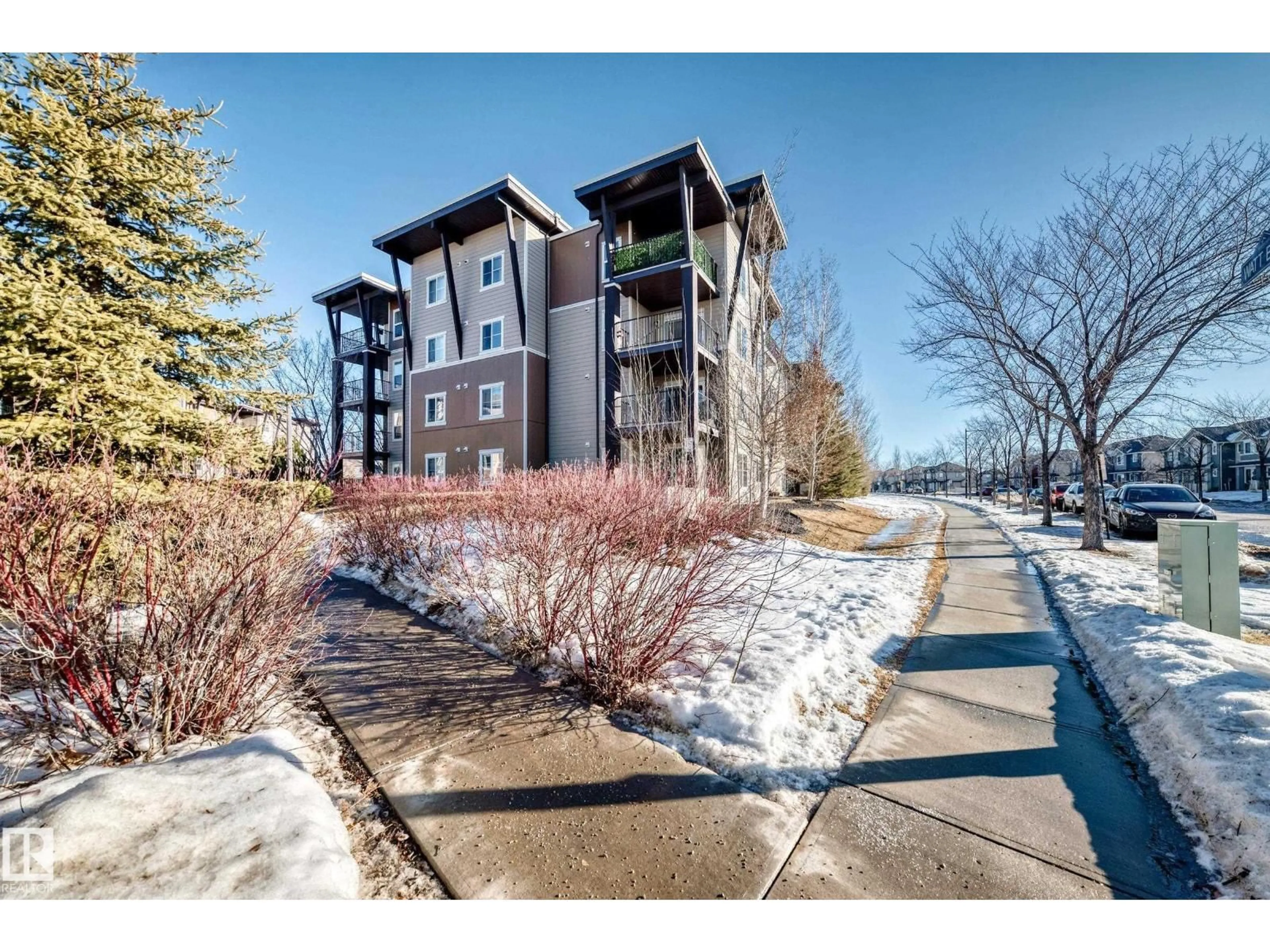 A pic from outside/outdoor area/front of a property/back of a property/a pic from drone, street for #302 - 530 WATT BV, Edmonton Alberta T6X1P7