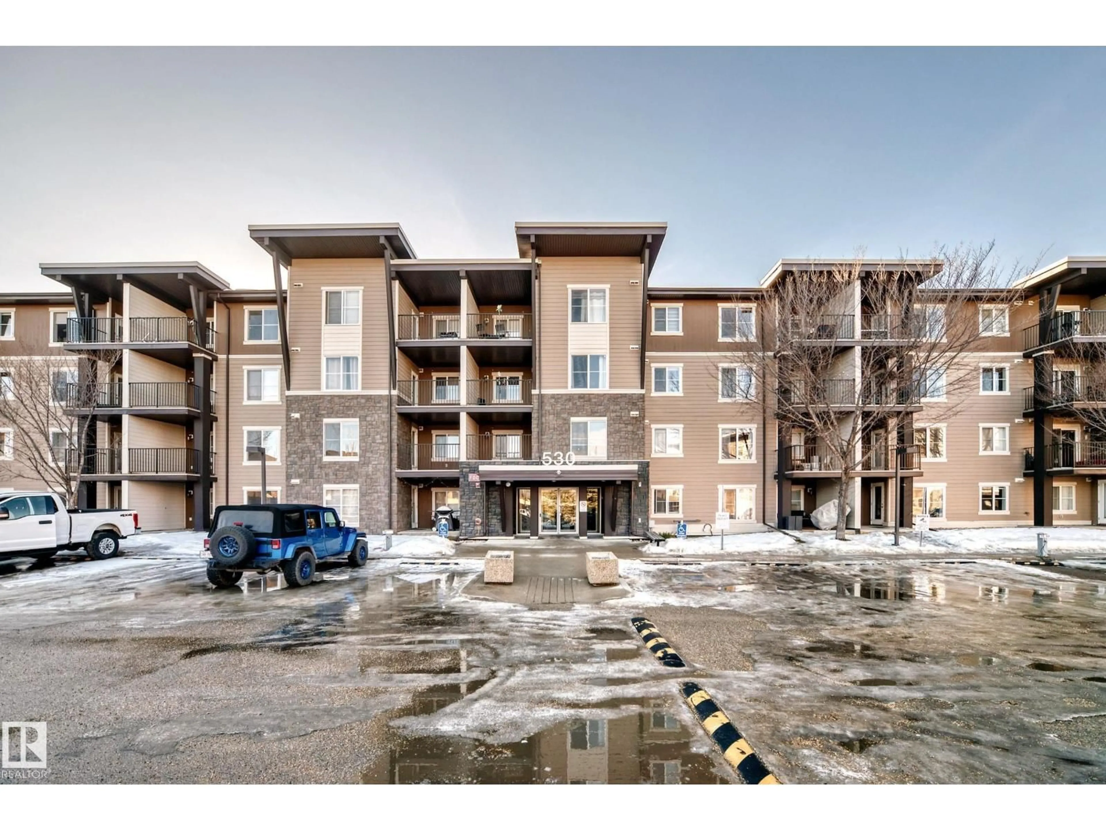A pic from outside/outdoor area/front of a property/back of a property/a pic from drone, building for #302 - 530 WATT BV, Edmonton Alberta T6X1P7