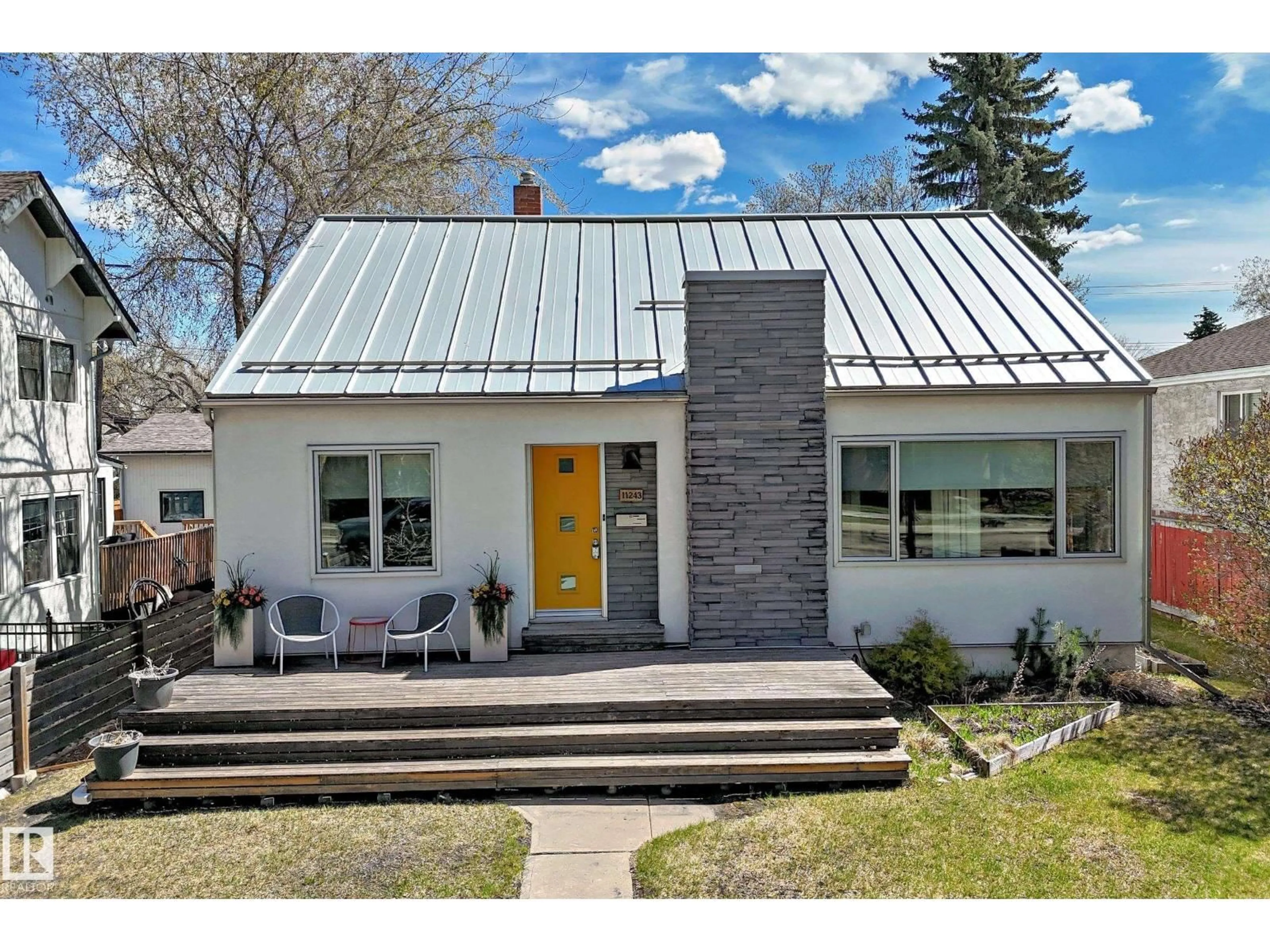 Home with brick exterior material, street for NW - 11243 127 ST, Edmonton Alberta T5M0T7