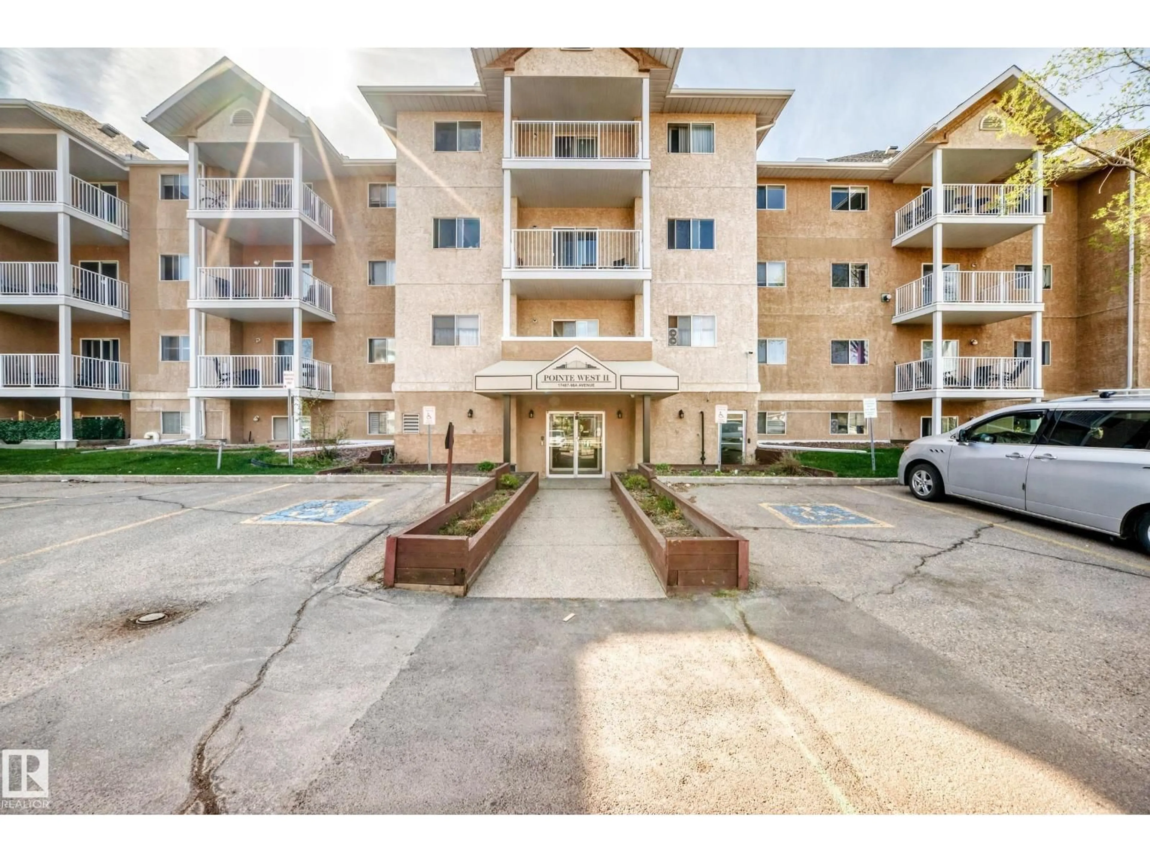 Patio, street for #403 - 17467 98A AV, Edmonton Alberta T5T6E9
