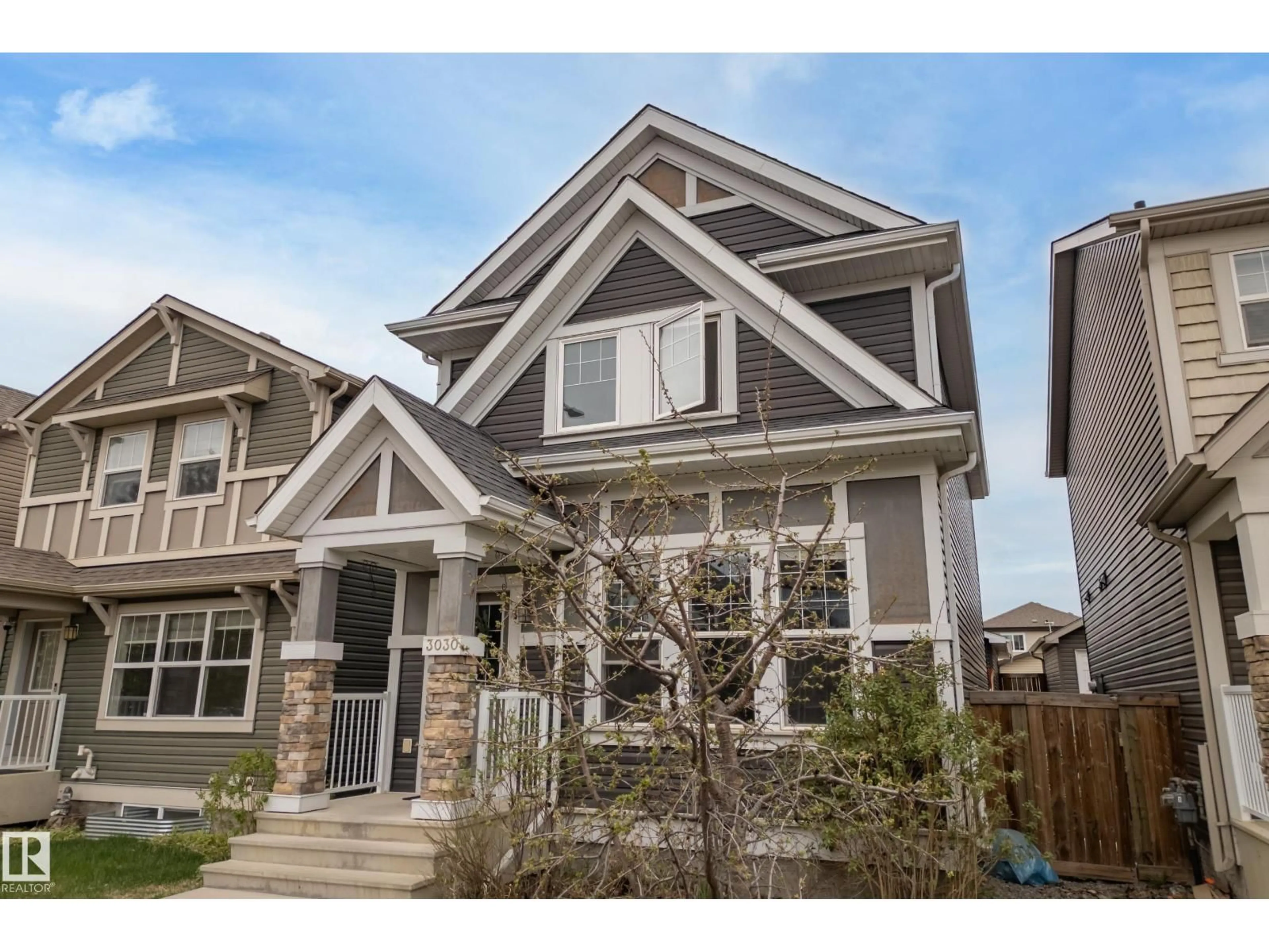 Home with vinyl exterior material, street for 3030 ARTHURS CR, Edmonton Alberta T6W2H9