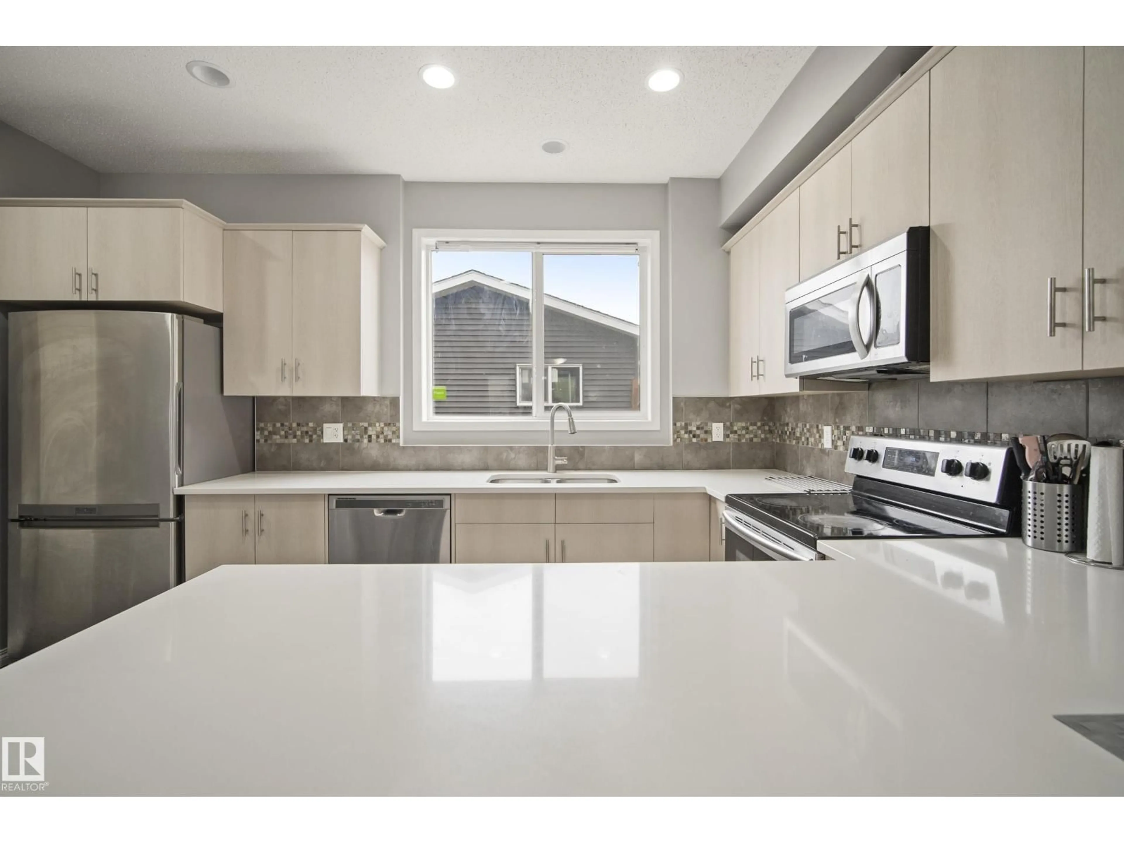 Open concept kitchen, ceramic/tile floor for 3030 ARTHURS CR, Edmonton Alberta T6W2H9