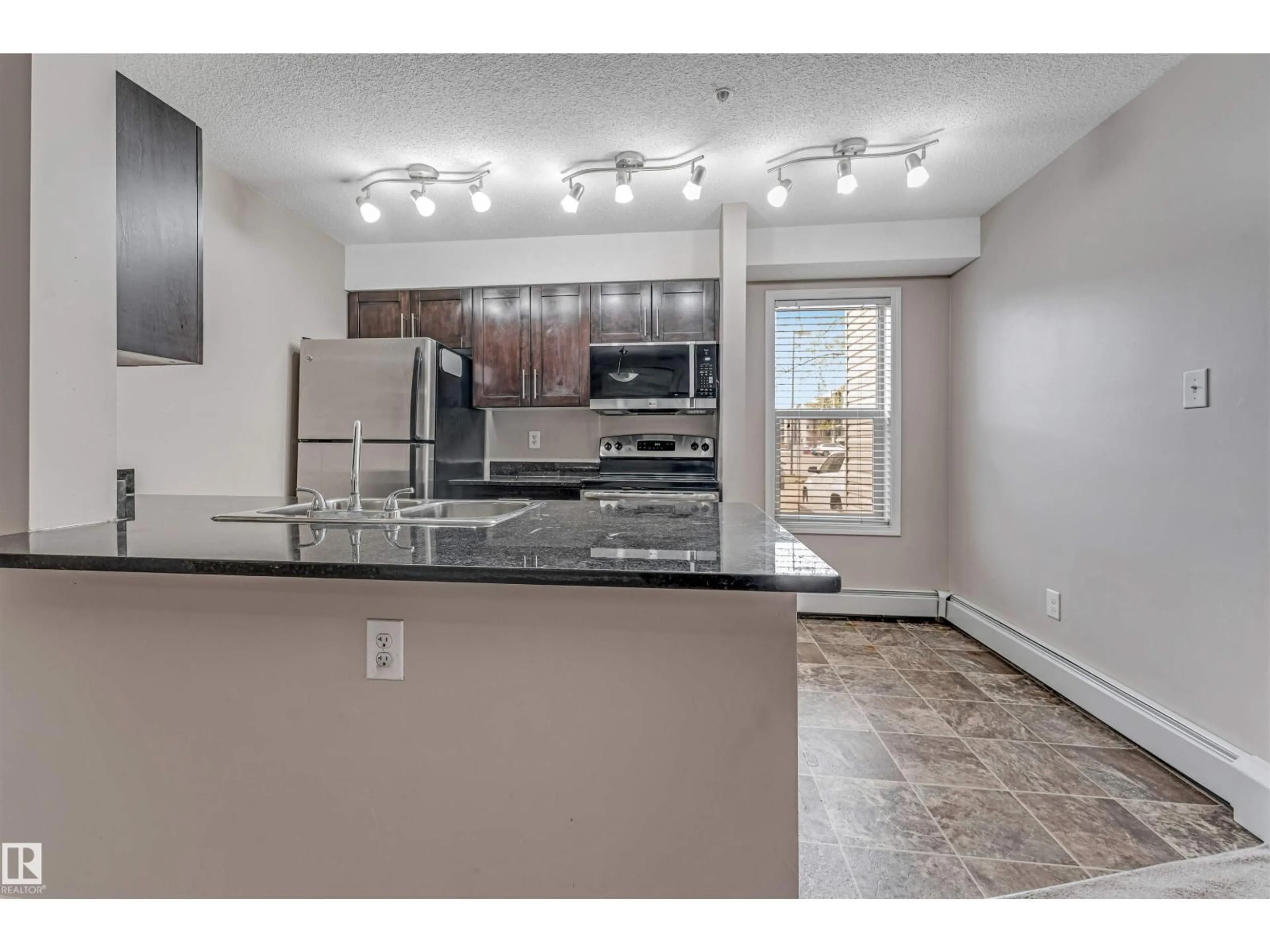 Open concept kitchen, unknown for 118 - 11803 22 AVE SW, Edmonton Alberta T6W2R9