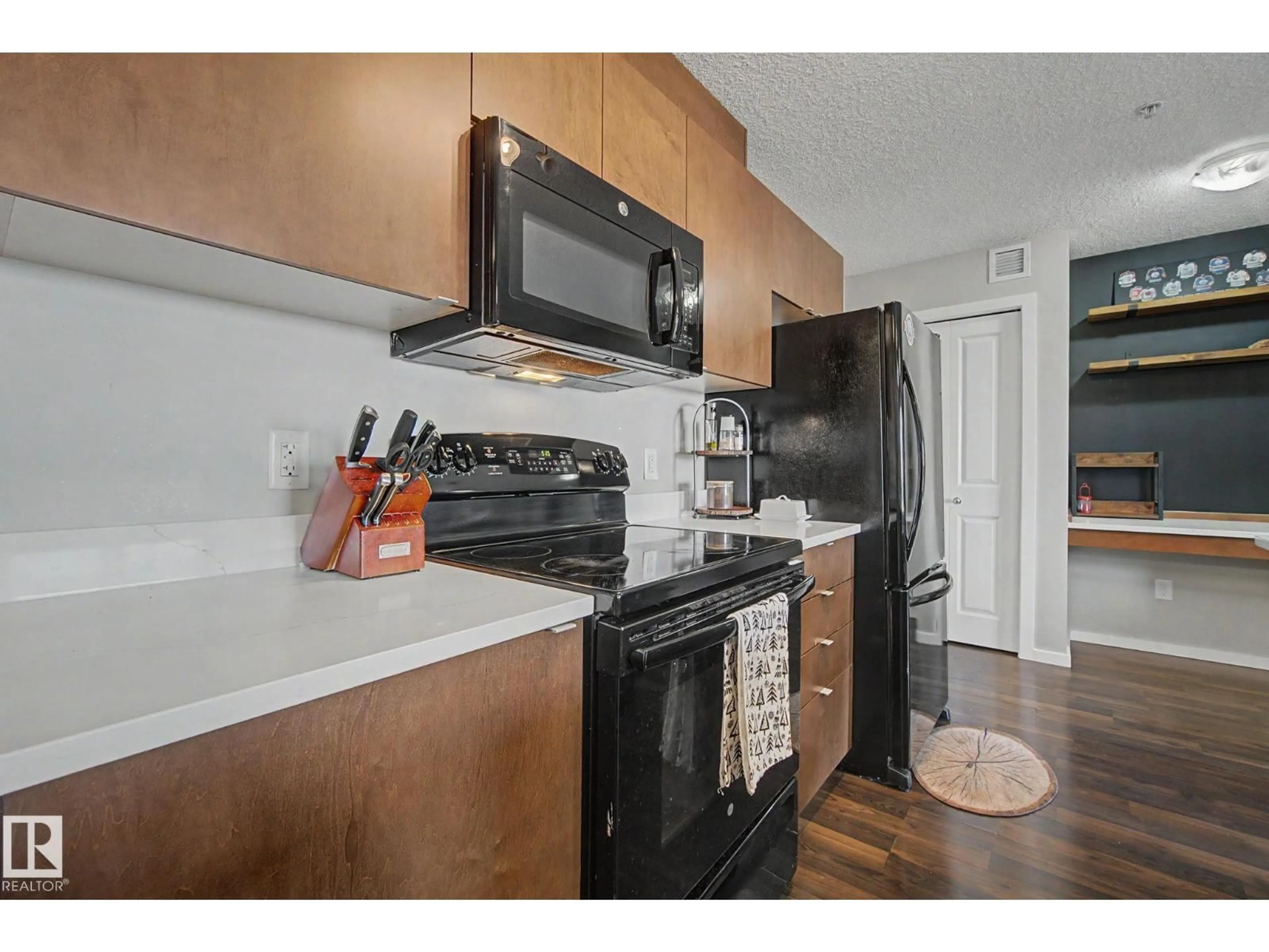 Standard kitchen, wood/laminate floor for 504 - 334 ALBANY WY, Edmonton Alberta T6V0L2