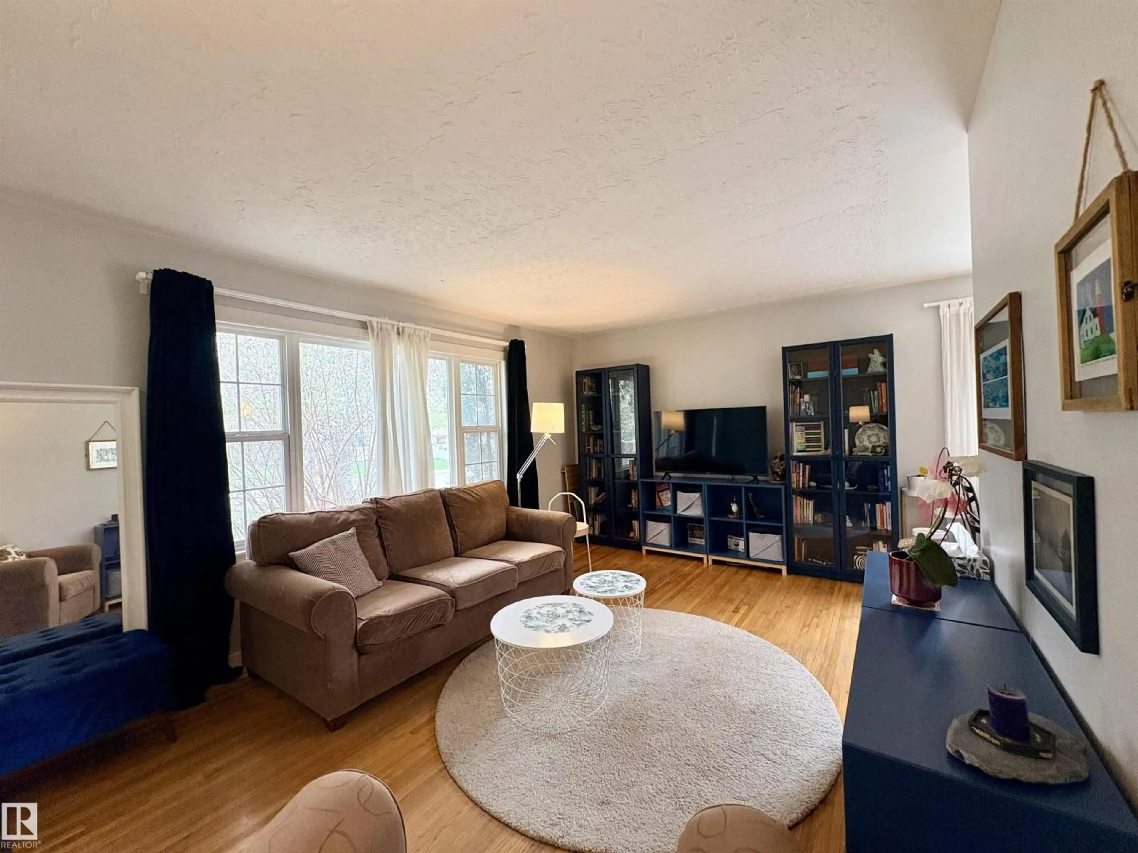 Living room with furniture, unknown for 9103 131 AV, Edmonton Alberta T5E0W1