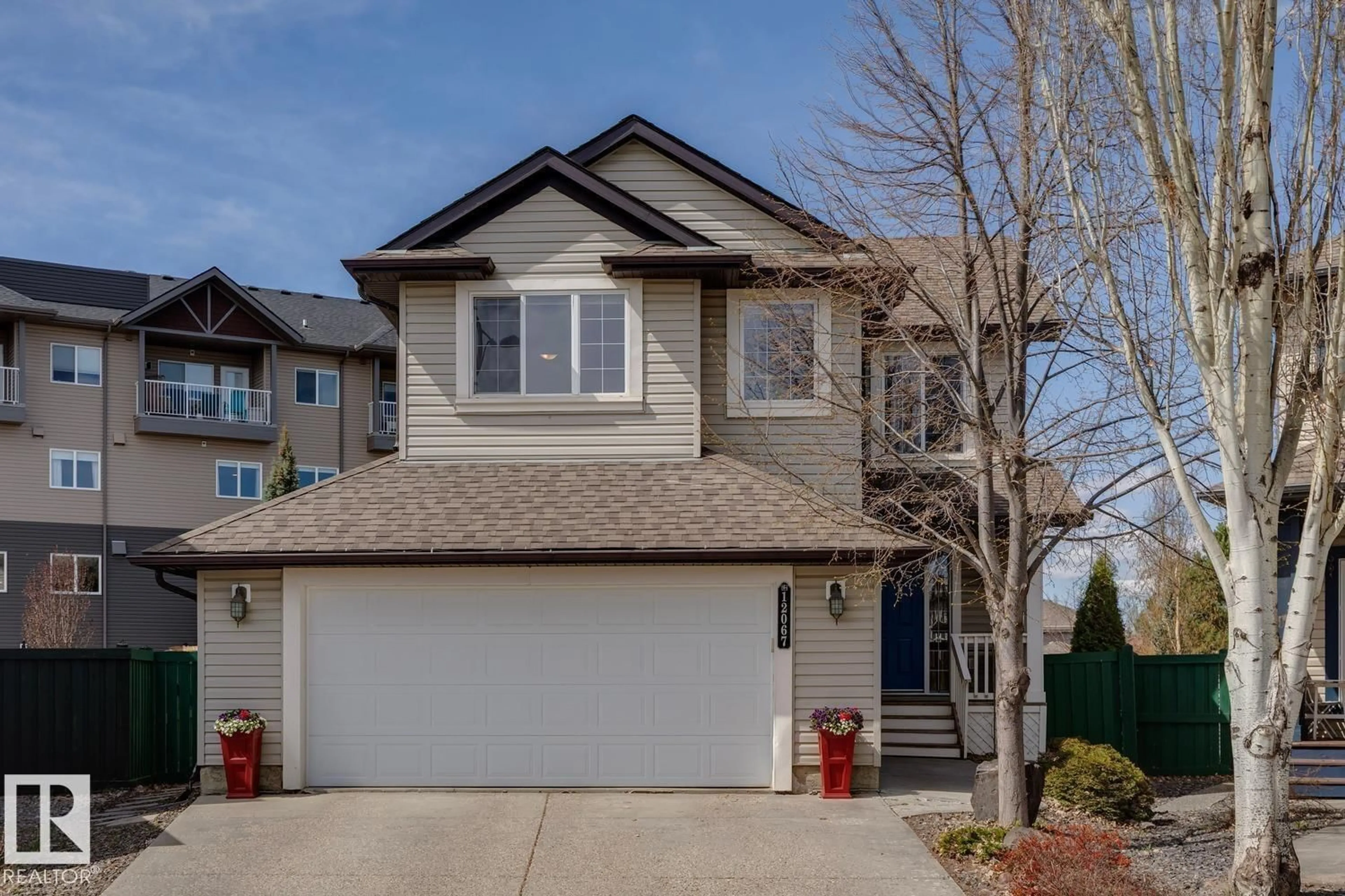 Home with vinyl exterior material, street for SW - 12067 21 AV, Edmonton Alberta T6W0C7