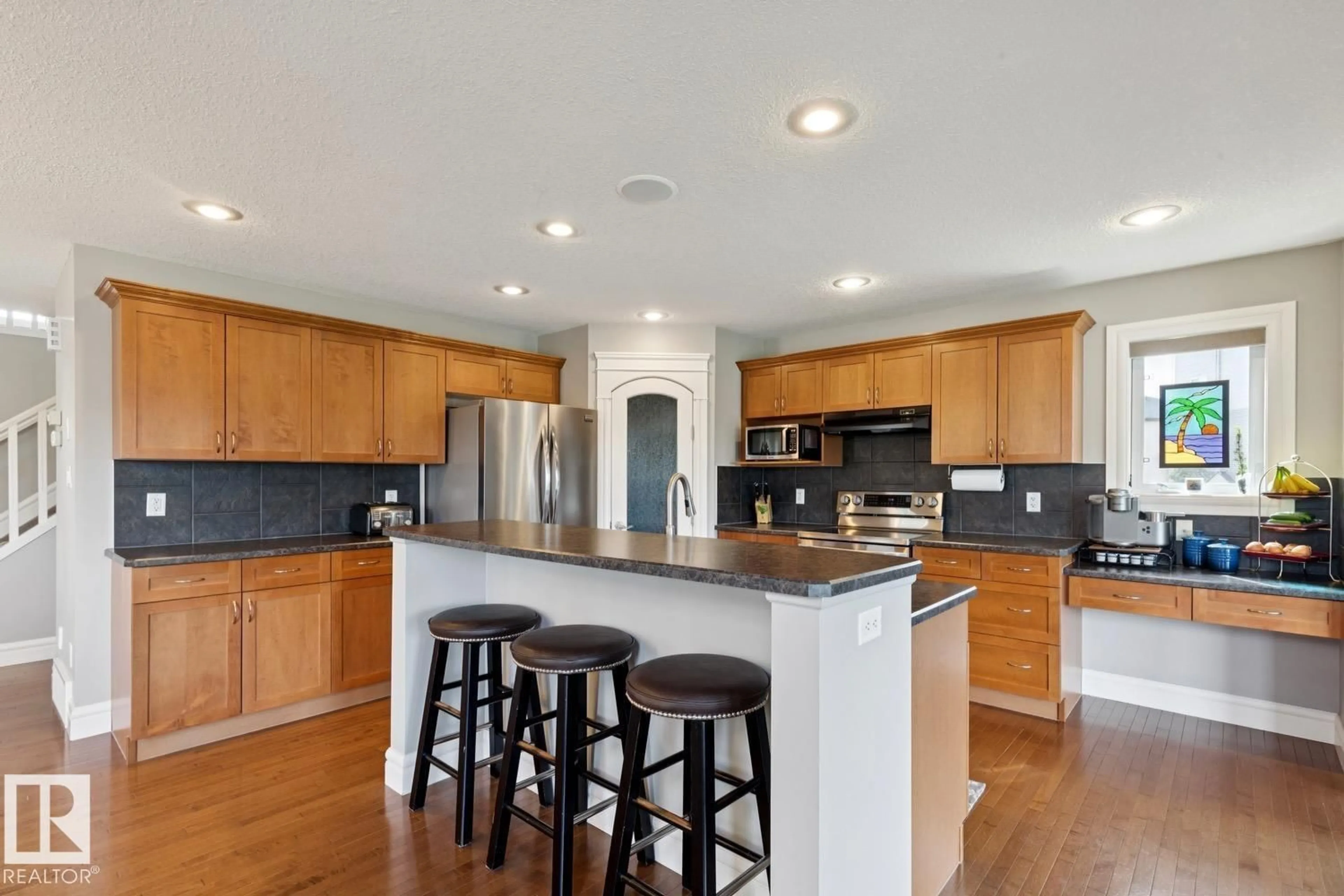 Open concept kitchen, ceramic/tile floor for SW - 12067 21 AV, Edmonton Alberta T6W0C7