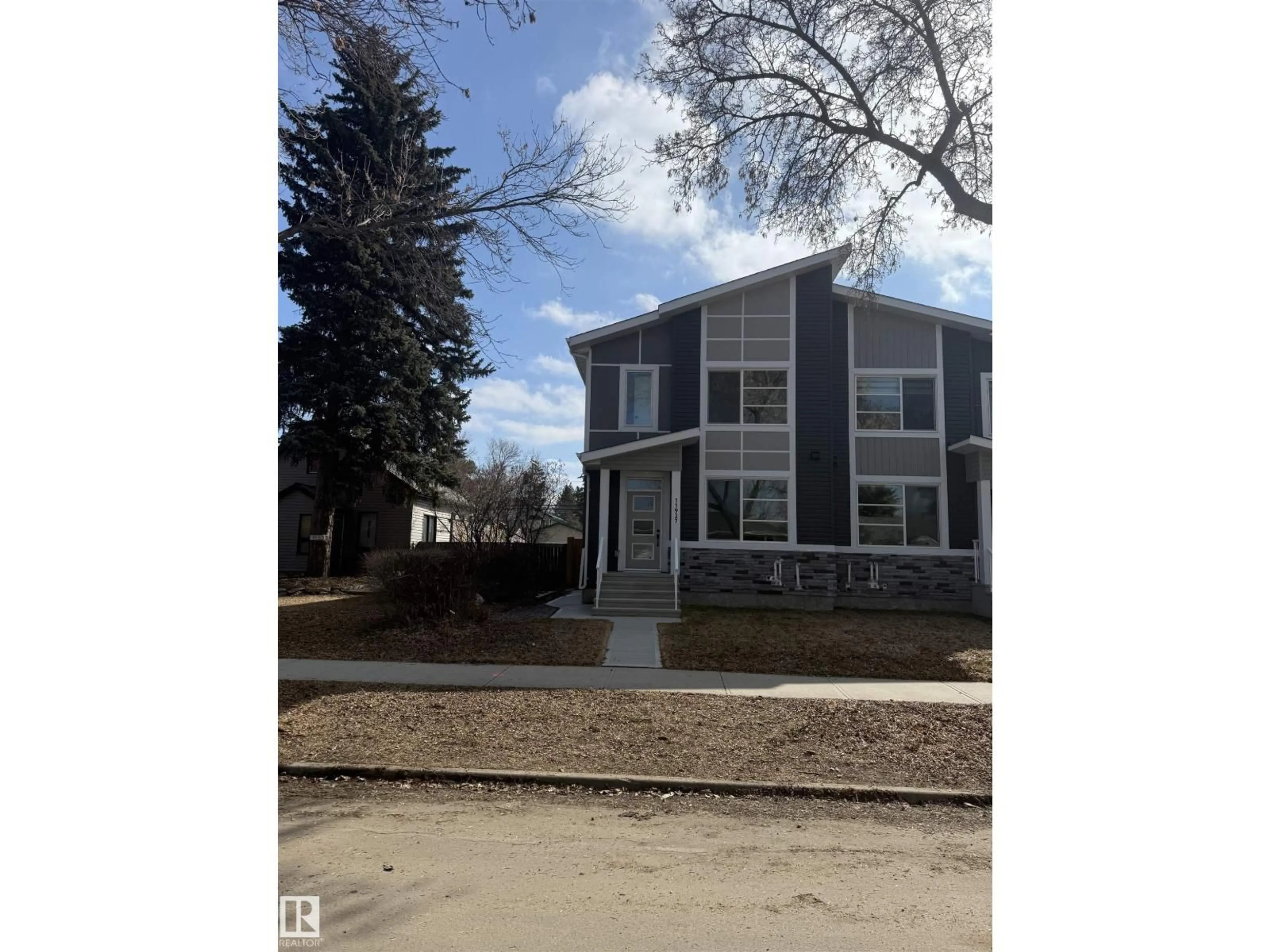 Home with vinyl exterior material, street for NW - 11927 123 ST, Edmonton Alberta T5L0G9