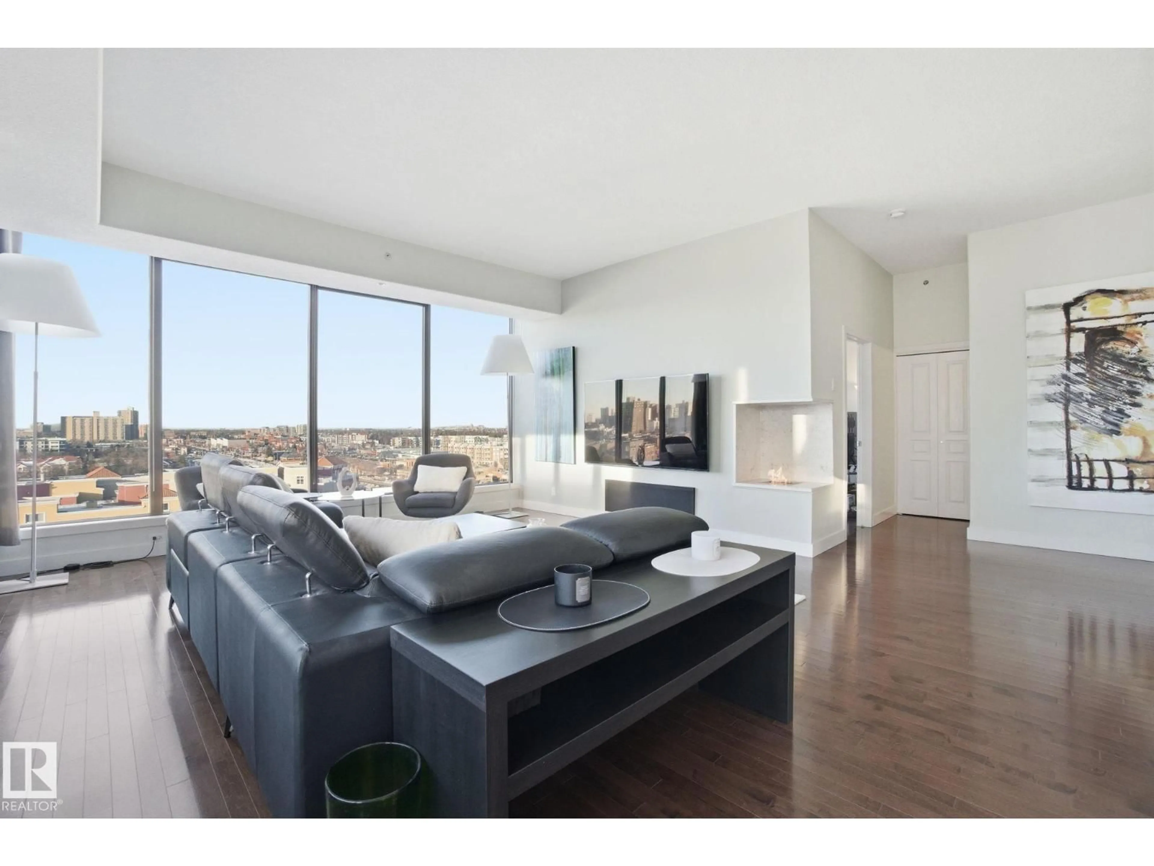 Living room with furniture, unknown for 10319 - 1102 111 ST NW, Edmonton Alberta T5K0A2