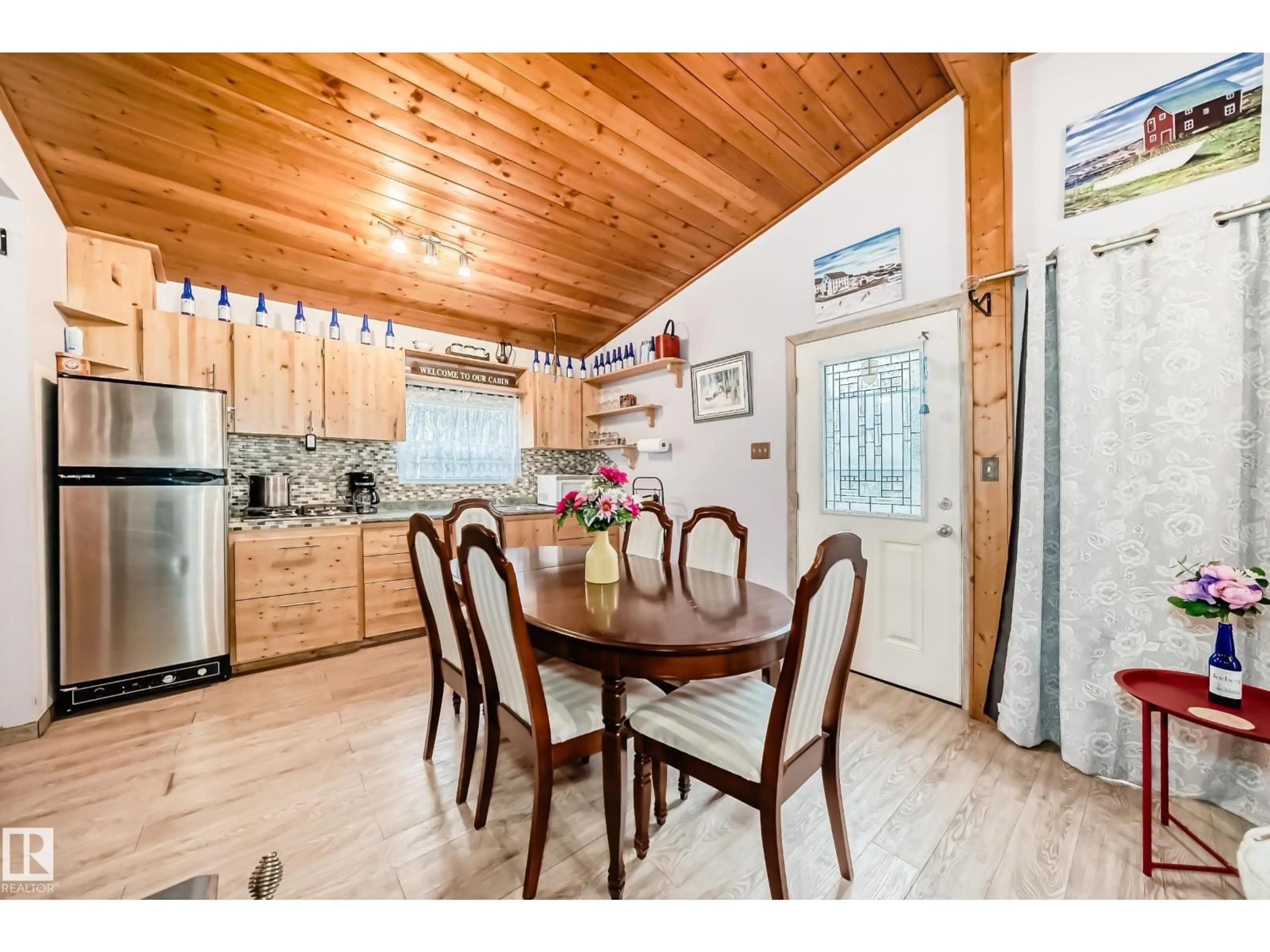 Dining room, wood/laminate floor for 575040 RANGE ROAD 173, Rural Lamont County Alberta T0B0W0