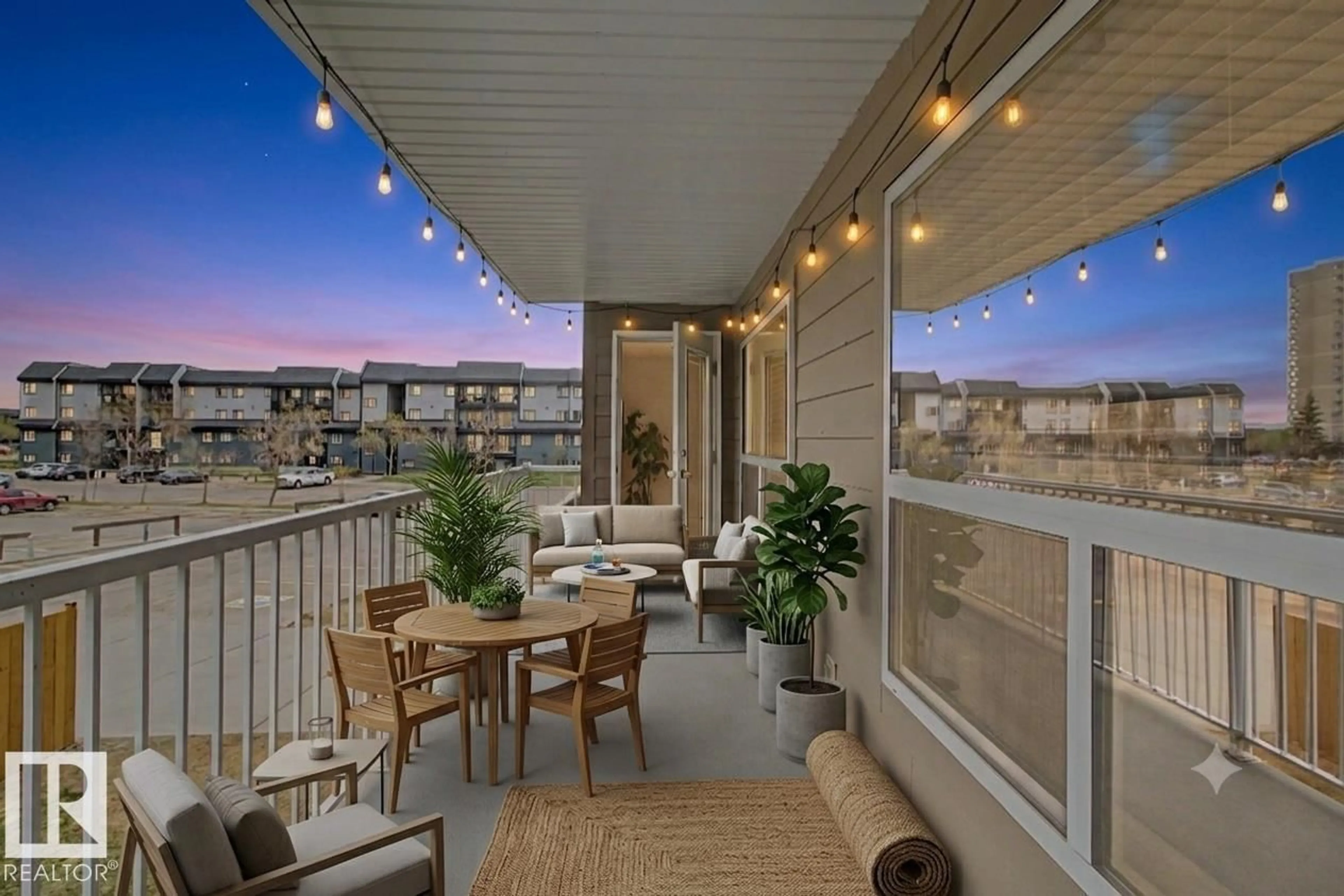 Patio, city buildings view from balcony for #213 - 17404 64 AV, Edmonton Alberta T5T6X4