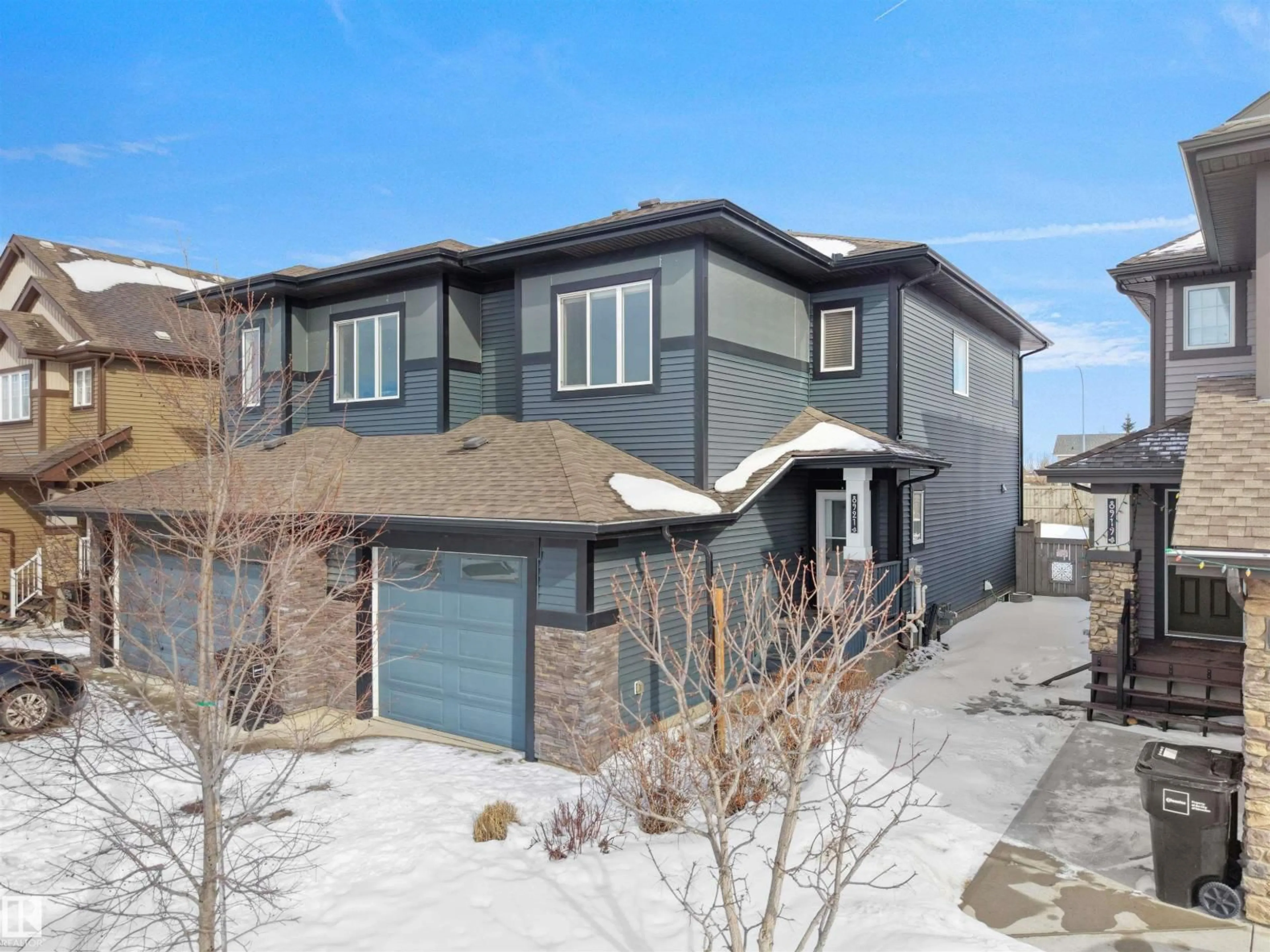 Home with brick exterior material, street for NW - 8921 217 ST, Edmonton Alberta T5T7C4