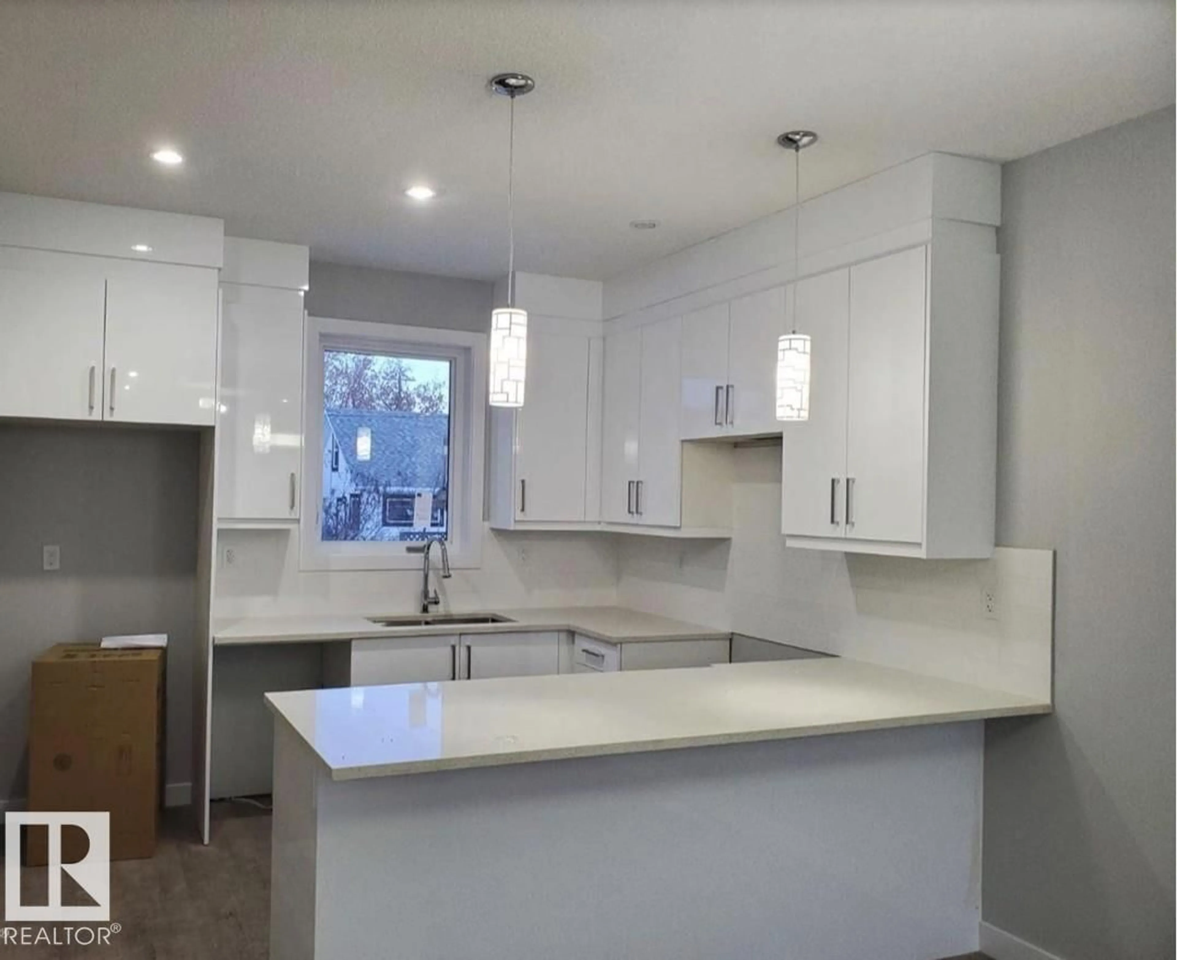 Open concept kitchen, ceramic/tile floor for NW - 12104 120 AV, Edmonton Alberta T5L3B8