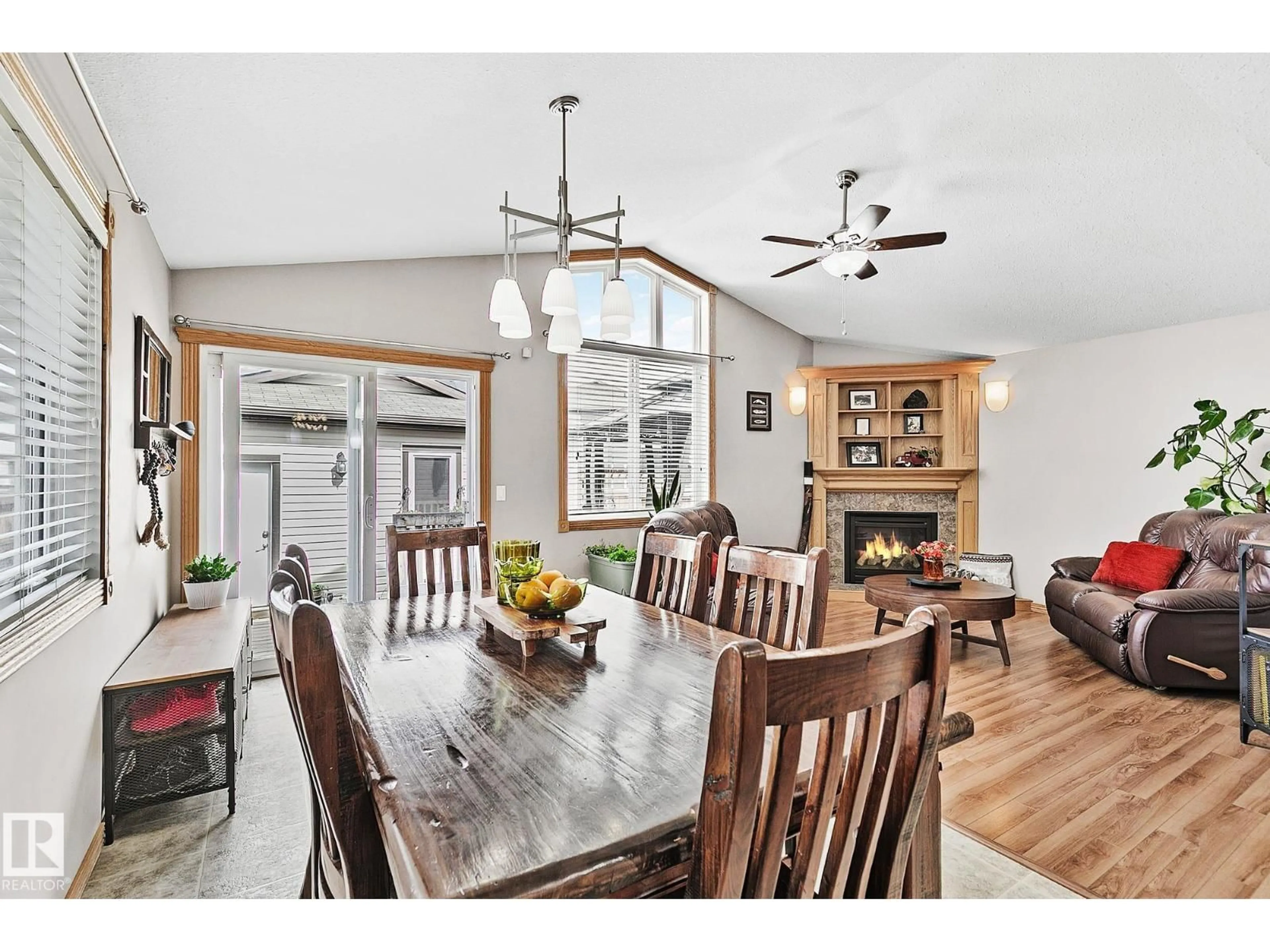 Open concept kitchen, wood/laminate floor for 98 HEWITT CI, Spruce Grove Alberta T7X0P2