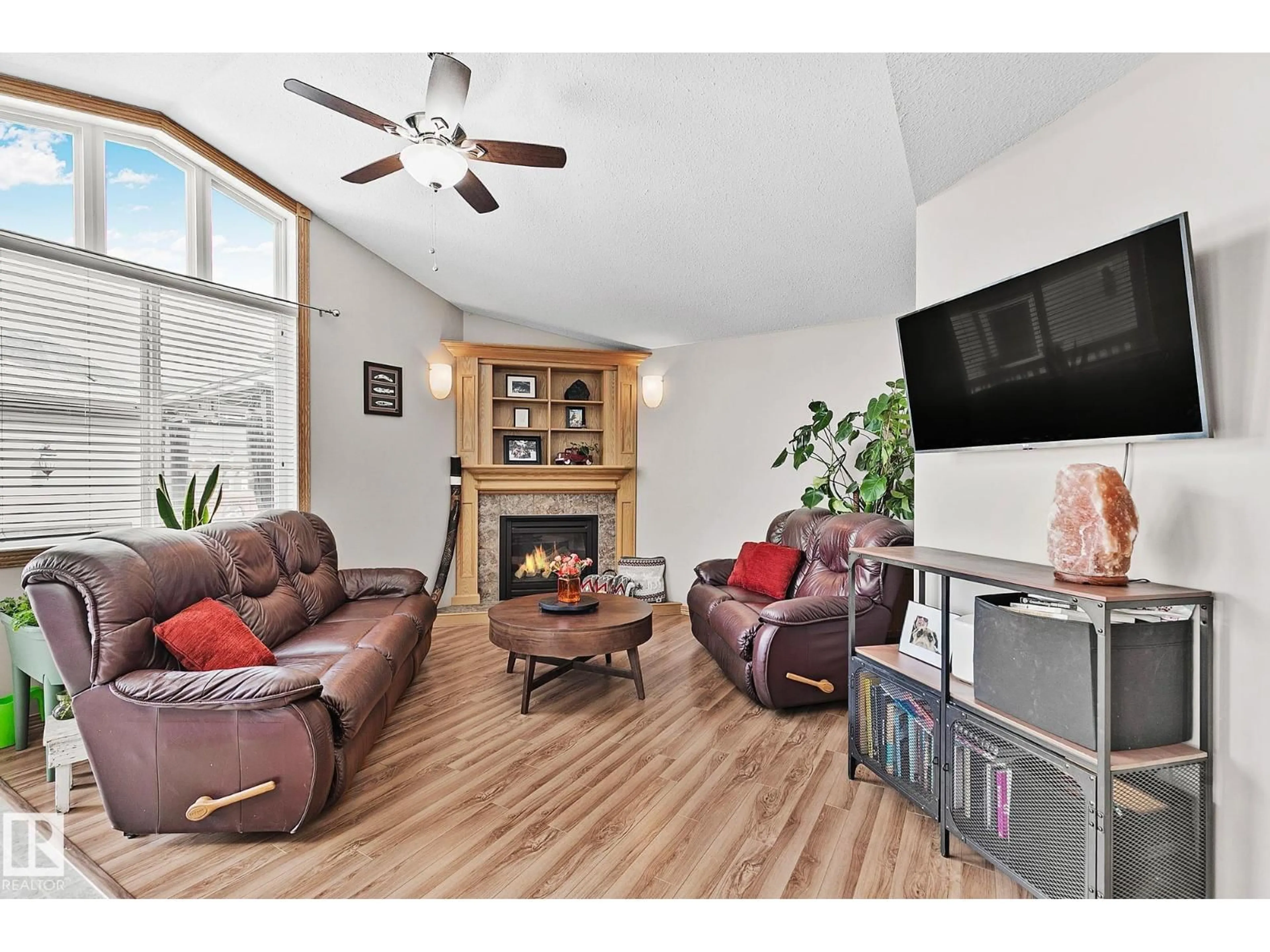 Living room with furniture, wood/laminate floor for 98 HEWITT CI, Spruce Grove Alberta T7X0P2