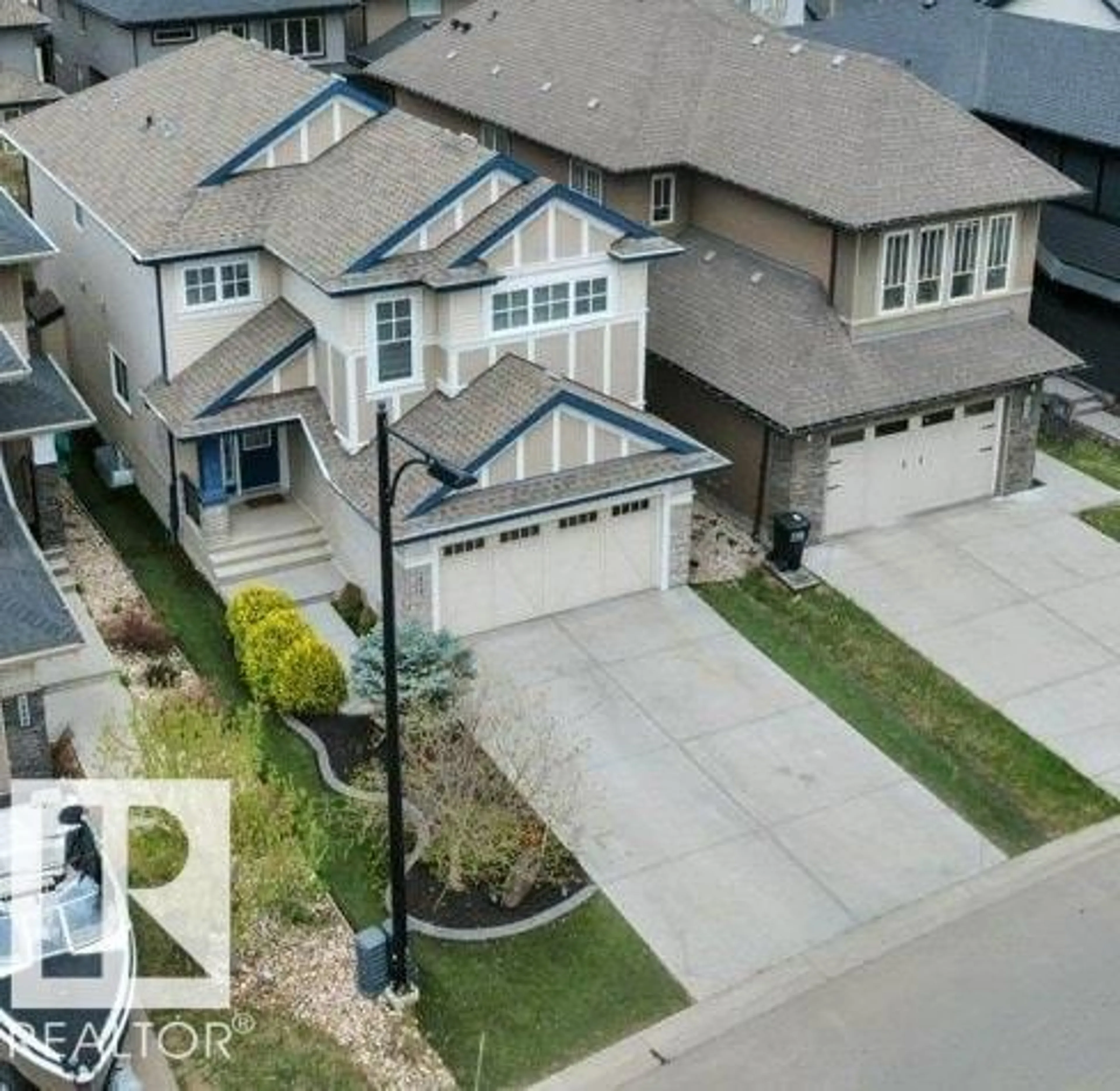 A pic from outside/outdoor area/front of a property/back of a property/a pic from drone, street for 1958 AINSLIE LINK, Edmonton Alberta T6W2L9