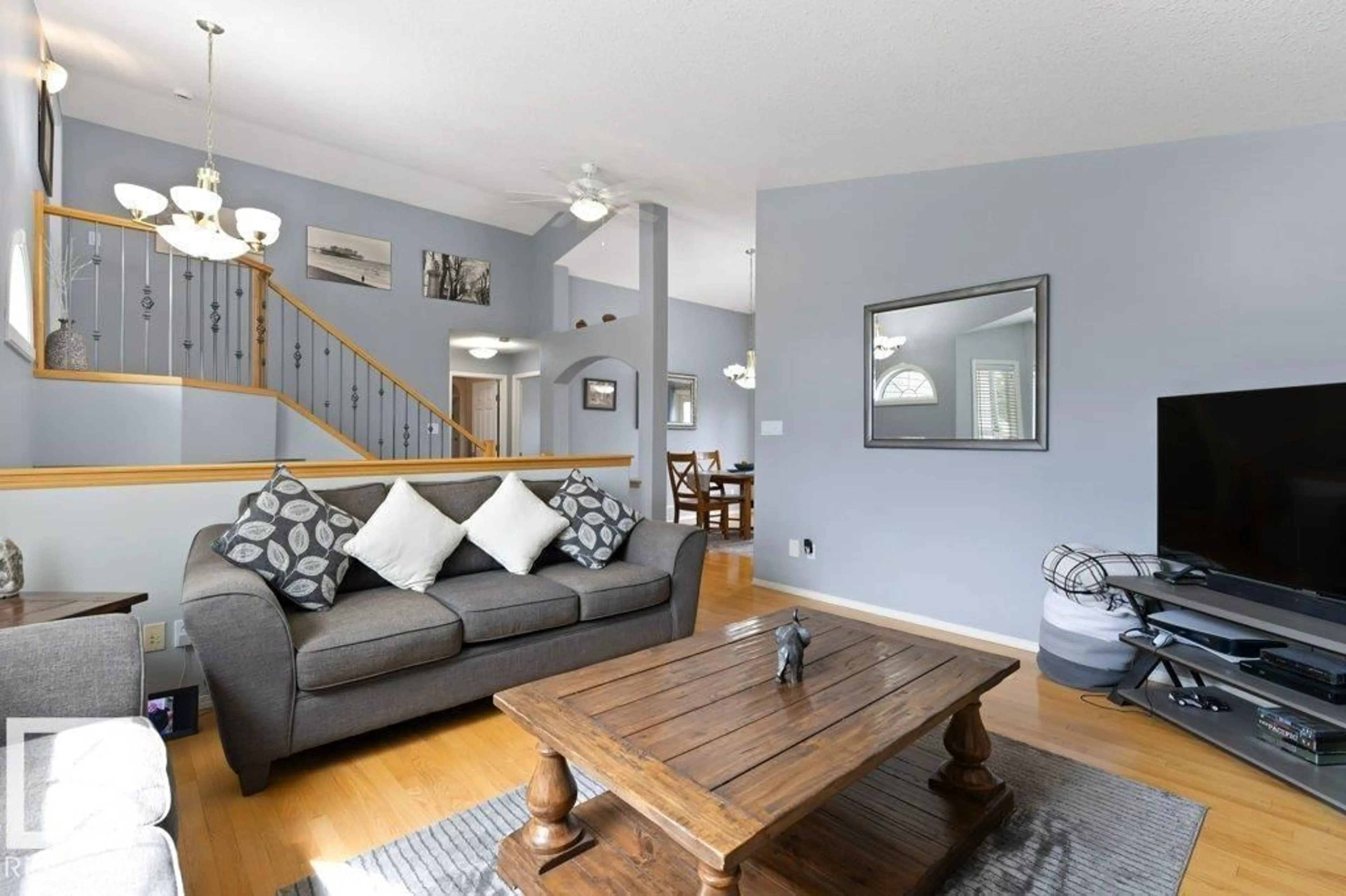 Living room with furniture, wood/laminate floor for 25100 - 400 TWP ROAD 554, Cardiff Alberta T8R2G5
