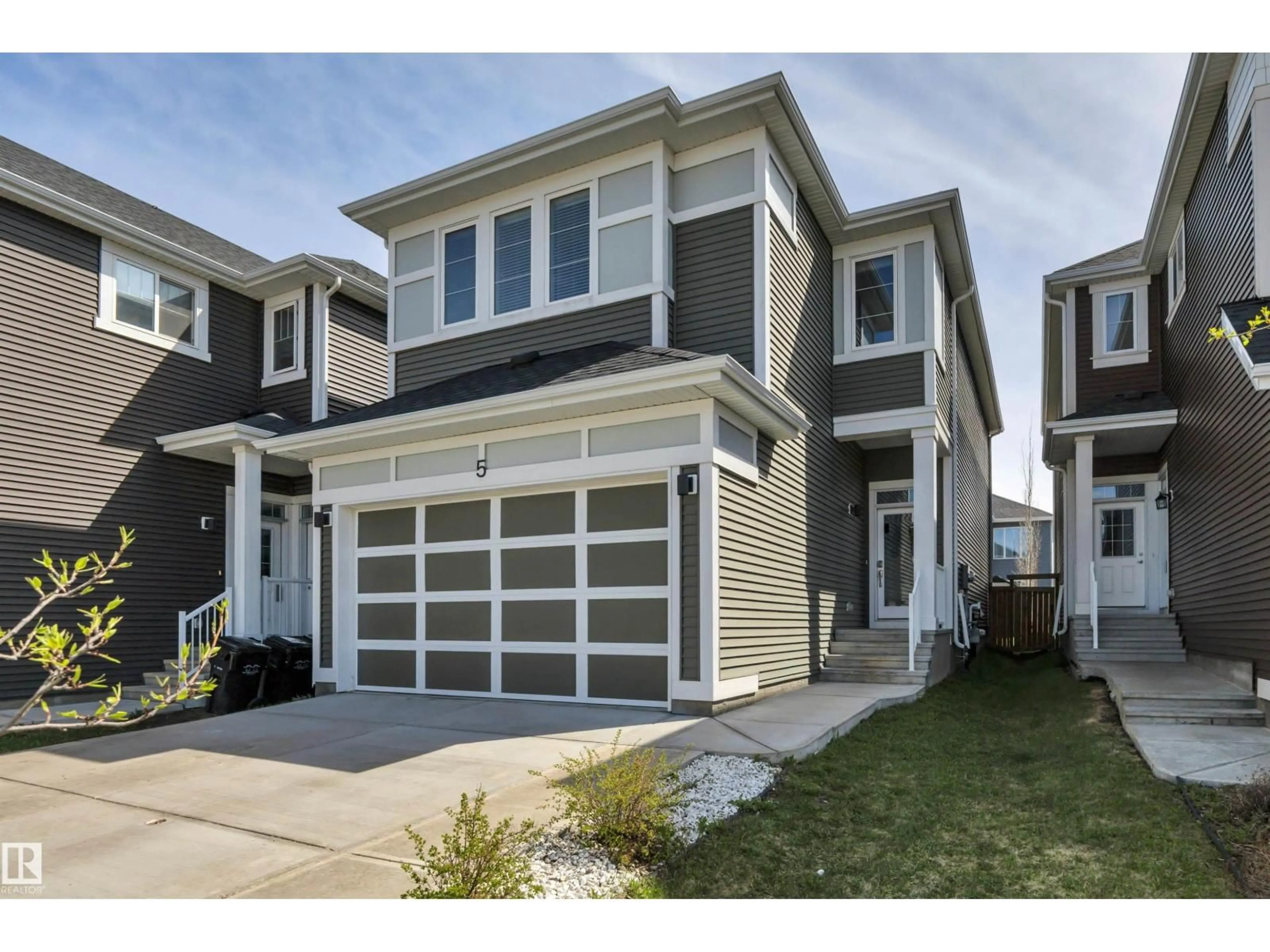 Home with vinyl exterior material, street for 5 STOUT PL, Leduc Alberta T9E1K4