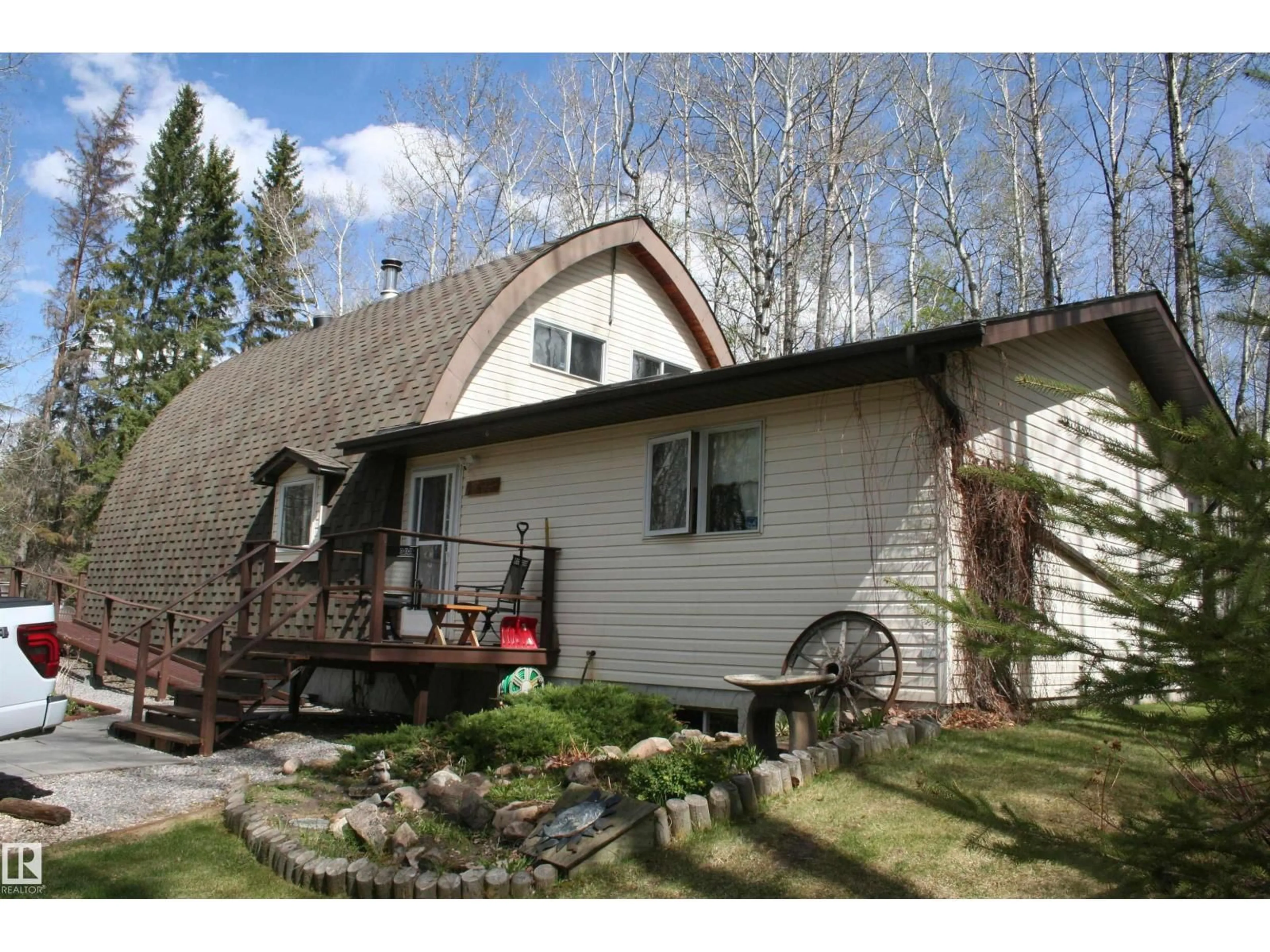 Home with vinyl exterior material, street for 26 - 464049 RGE ROAD 14, Rural Wetaskiwin County Alberta T0C2V0