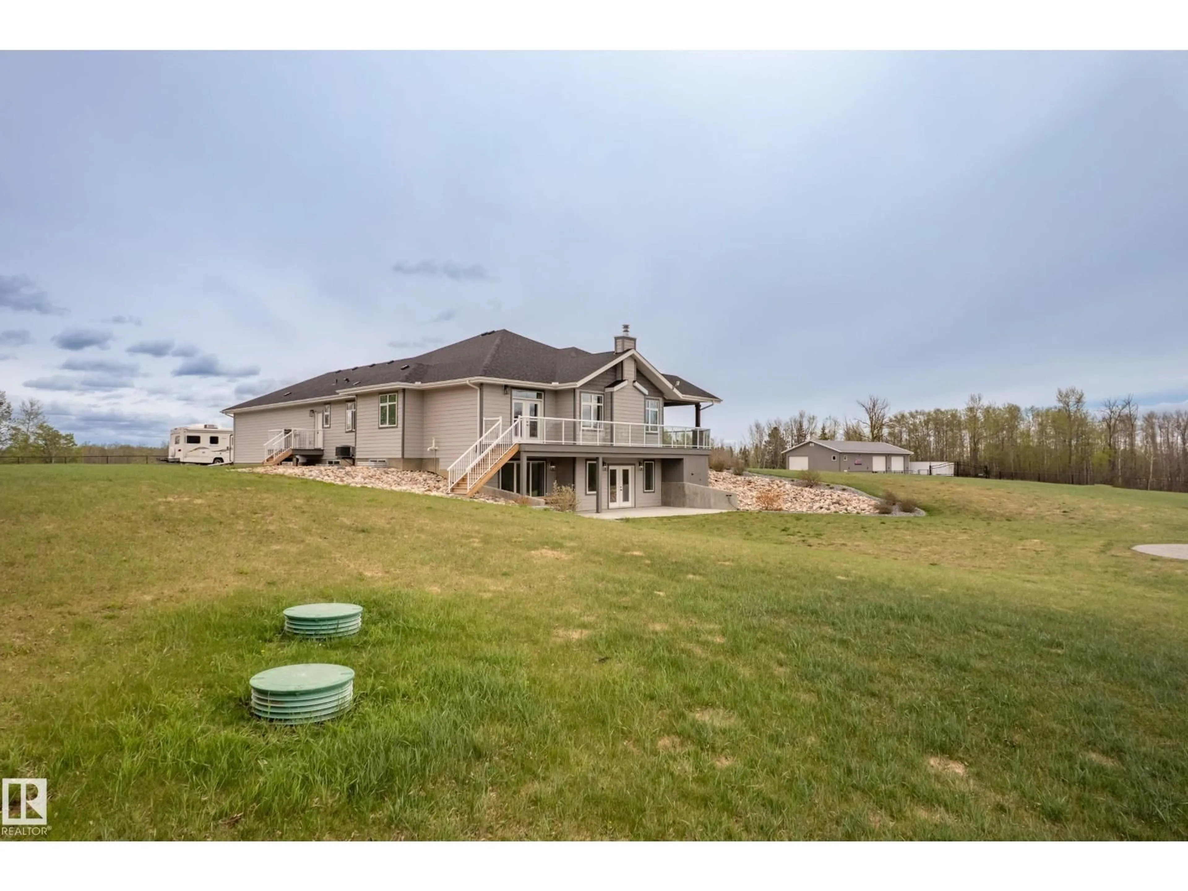 A pic from outside/outdoor area/front of a property/back of a property/a pic from drone, unknown for 52502 RGE ROAD 22 A, Rural Parkland County Alberta T7Y3C5