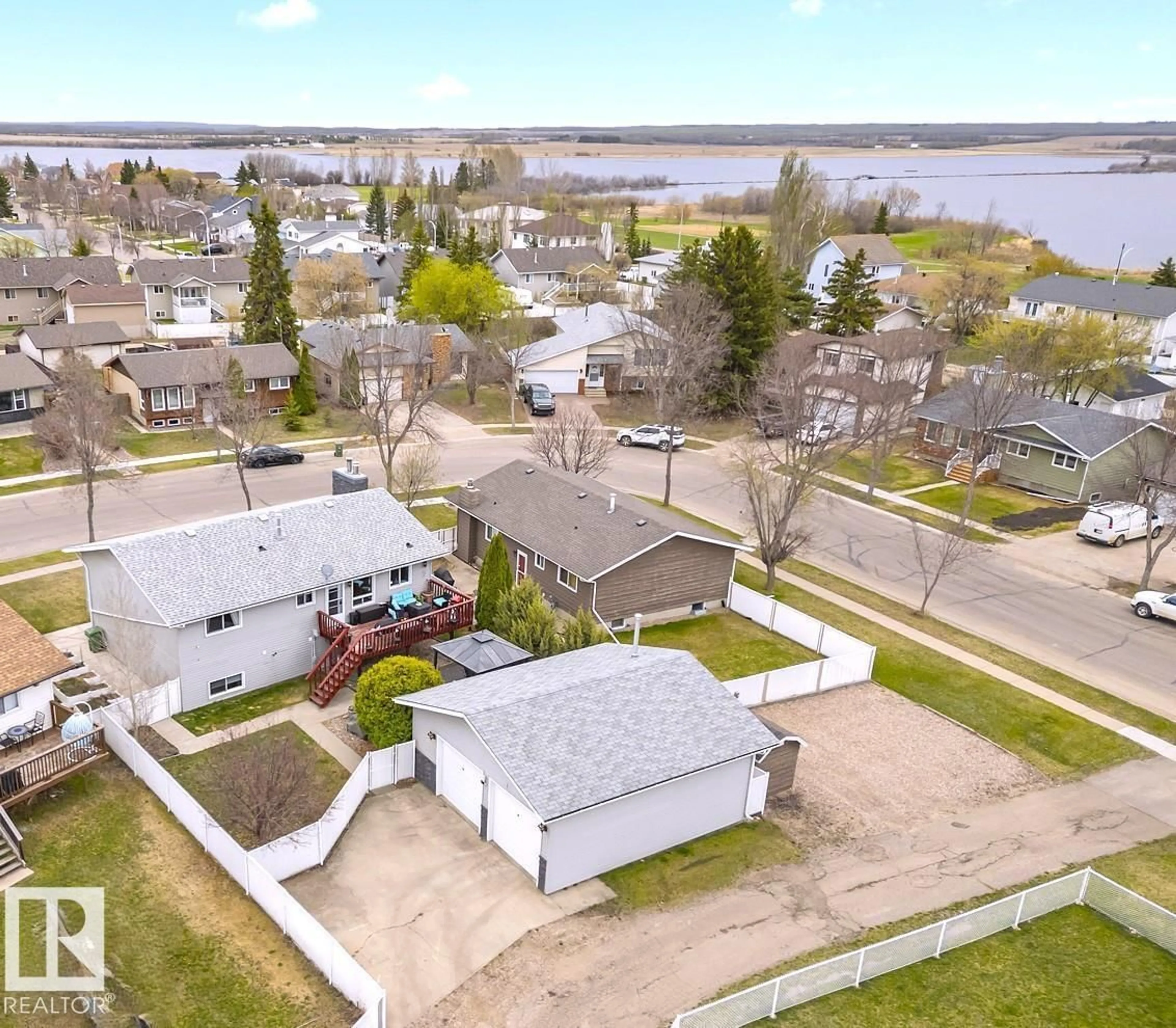 A pic from outside/outdoor area/front of a property/back of a property/a pic from drone, water/lake/river/ocean view for 4104 43 ST, Bonnyville Town Alberta T9N1R6