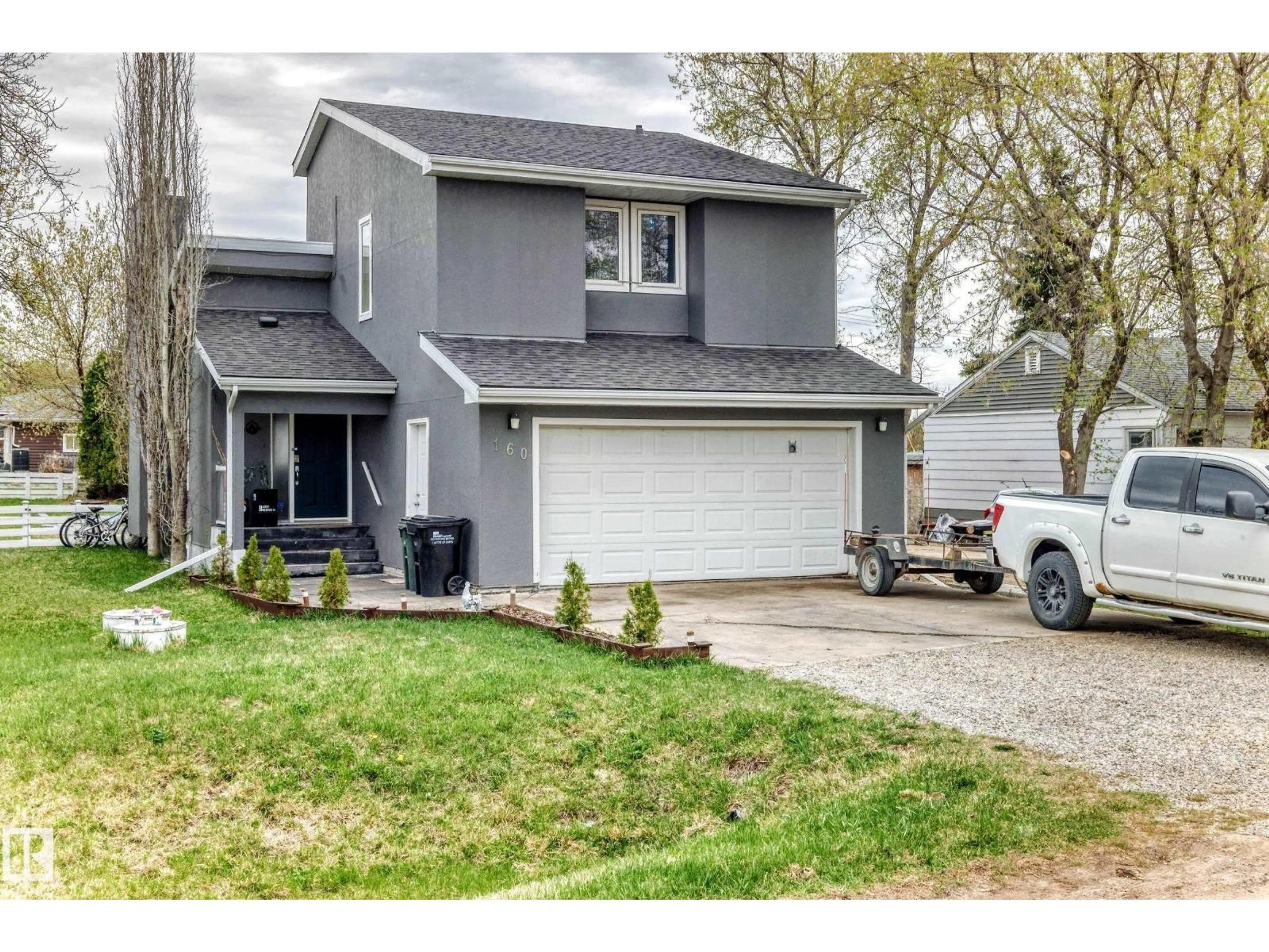 Home with vinyl exterior material, street for 160 22106 SOUTH COOKING LK, Rural Strathcona County Alberta T8E1J1