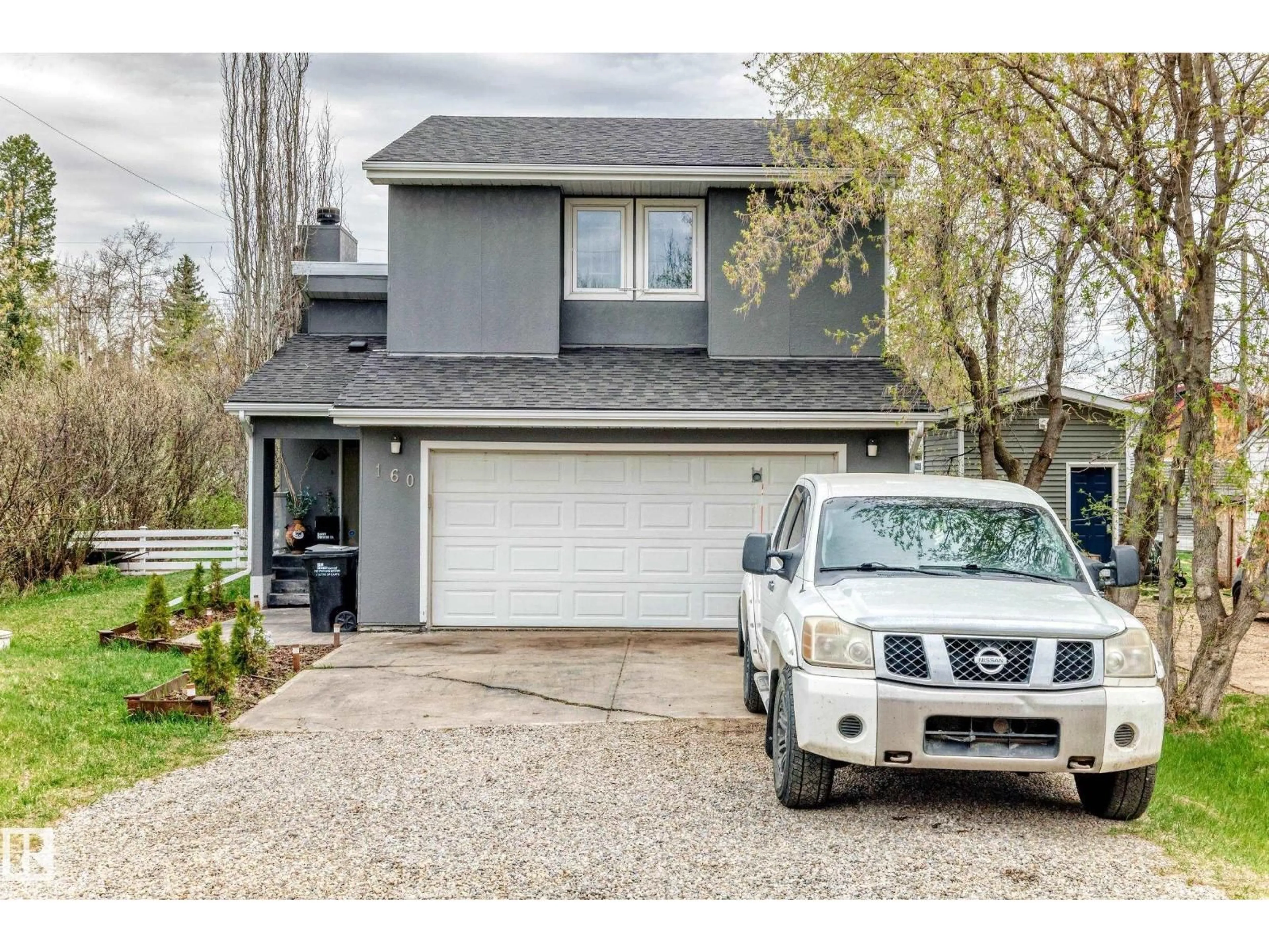 Home with vinyl exterior material, street for 160 22106 SOUTH COOKING LK, Rural Strathcona County Alberta T8E1J1