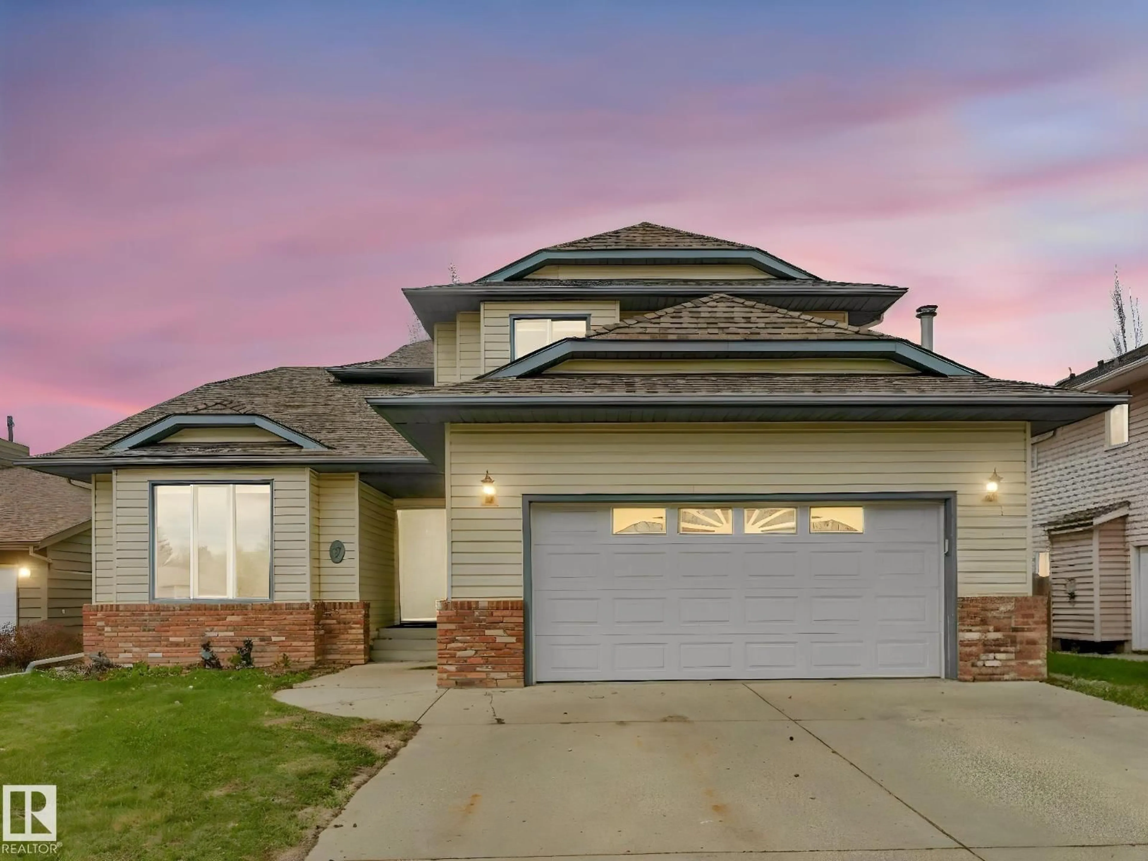 Home with vinyl exterior material, street for 7 HAVEN, Devon Alberta T9G1J7