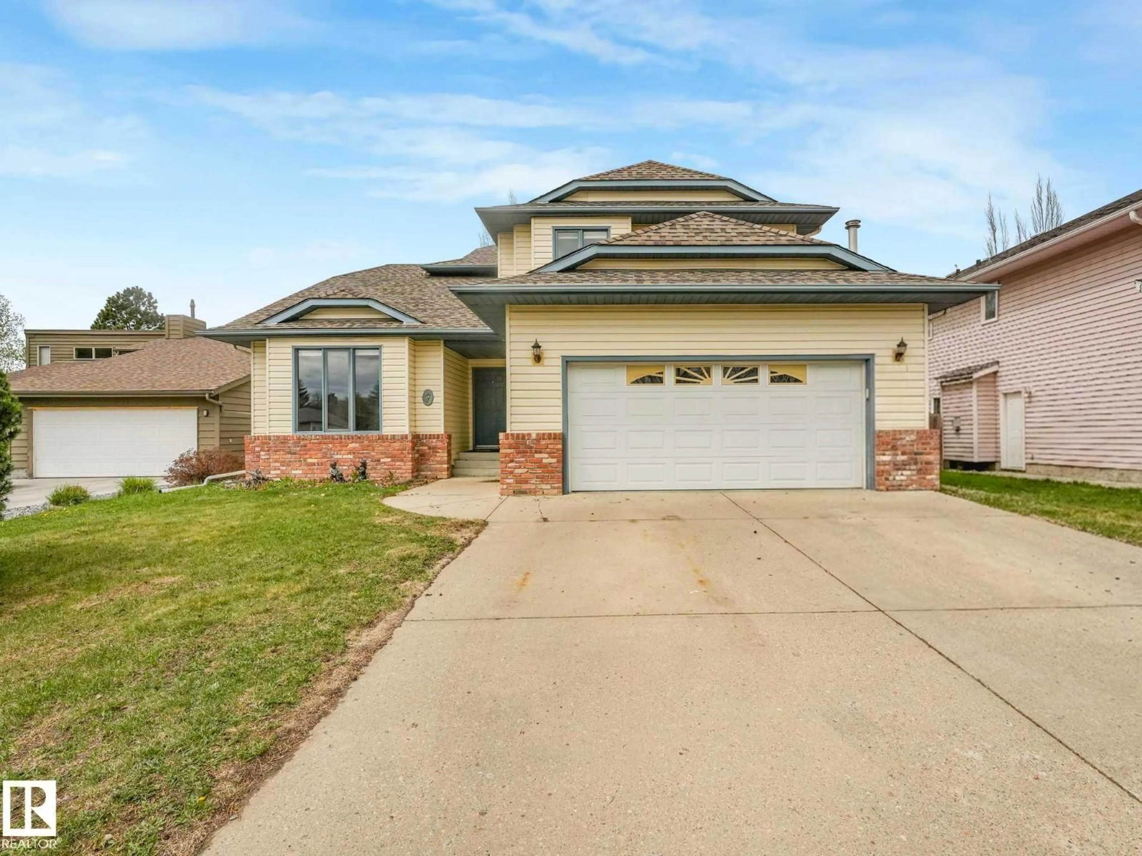 Home with vinyl exterior material, street for 7 HAVEN, Devon Alberta T9G1J7