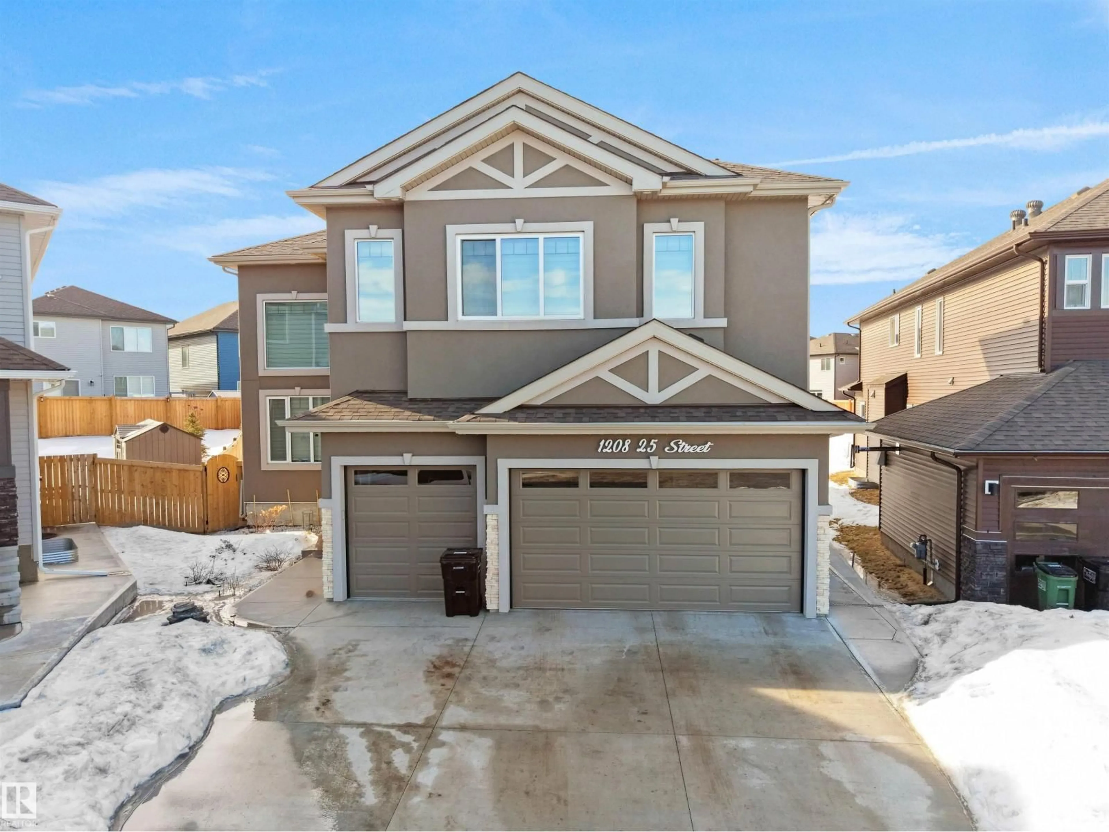 Home with vinyl exterior material, street for NW - 1208 25 ST, Edmonton Alberta T6T2J9
