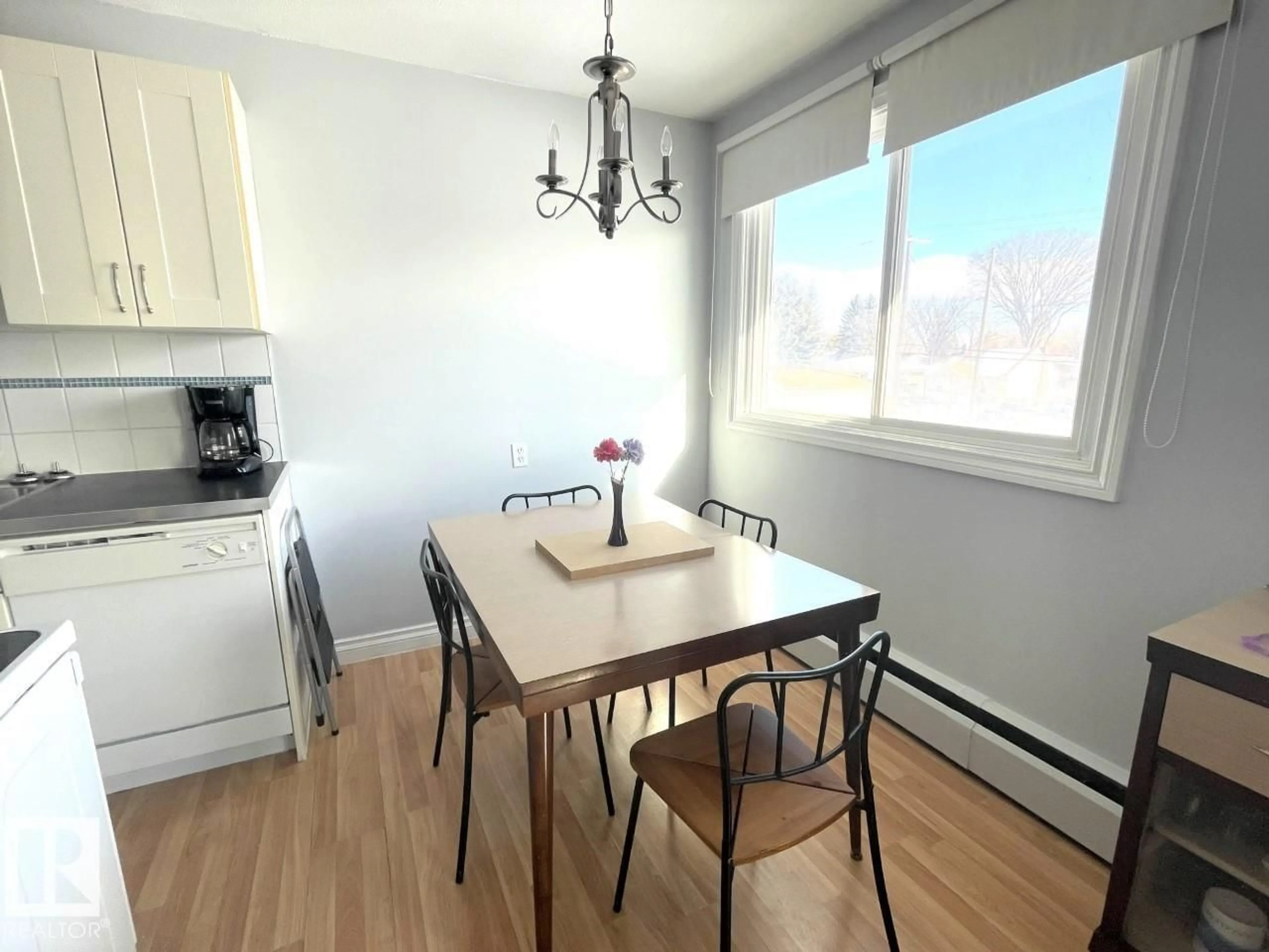 Dining room, wood/laminate floor for 303 - 12223 82 ST, Edmonton Alberta T5B2W9
