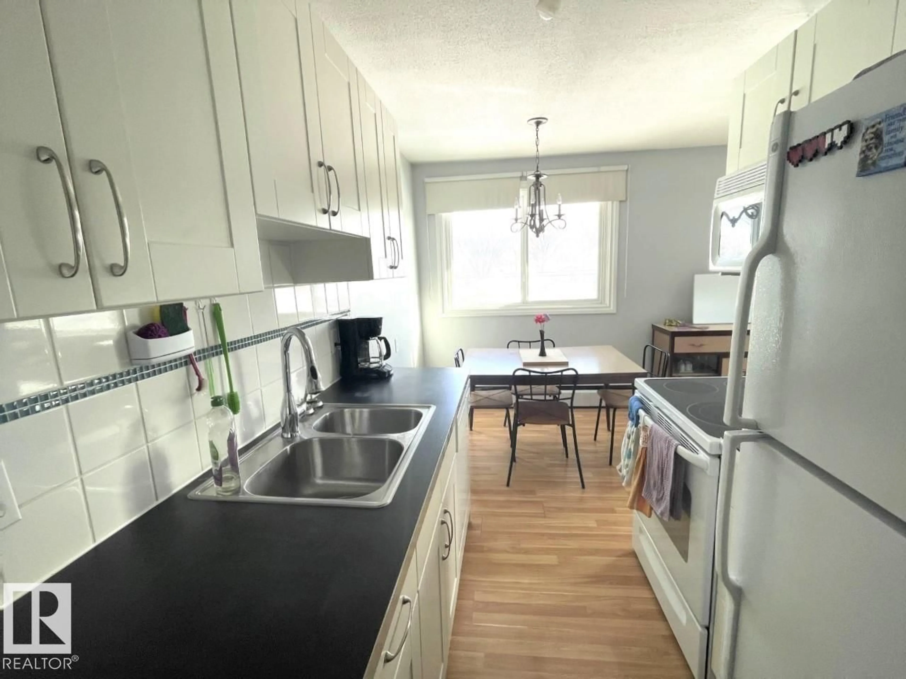 Standard kitchen, wood/laminate floor for 303 - 12223 82 ST, Edmonton Alberta T5B2W9