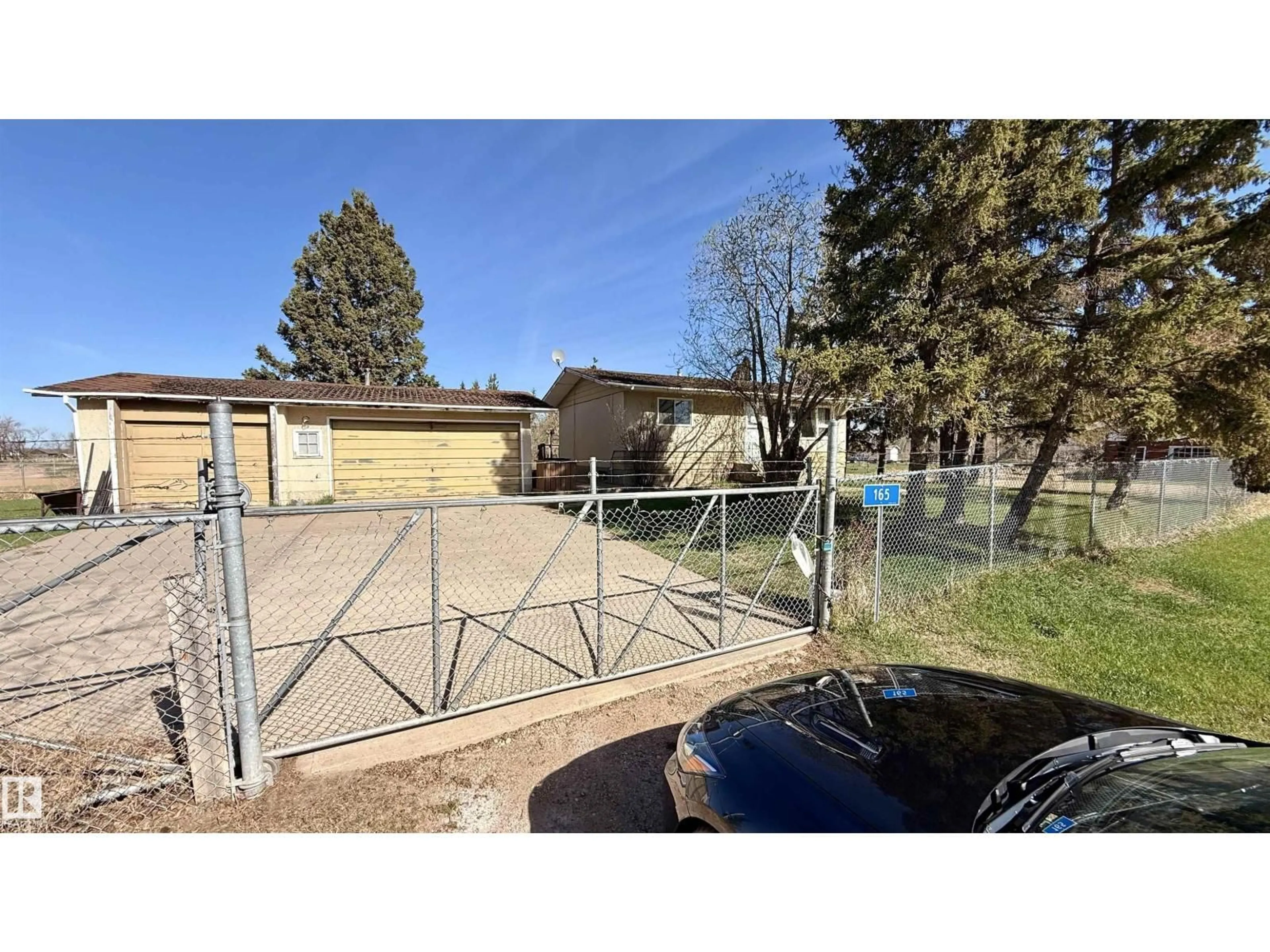 A pic from outside/outdoor area/front of a property/back of a property/a pic from drone, street for 175 - 165 540073, Rural Lamont County Alberta T0B2B0