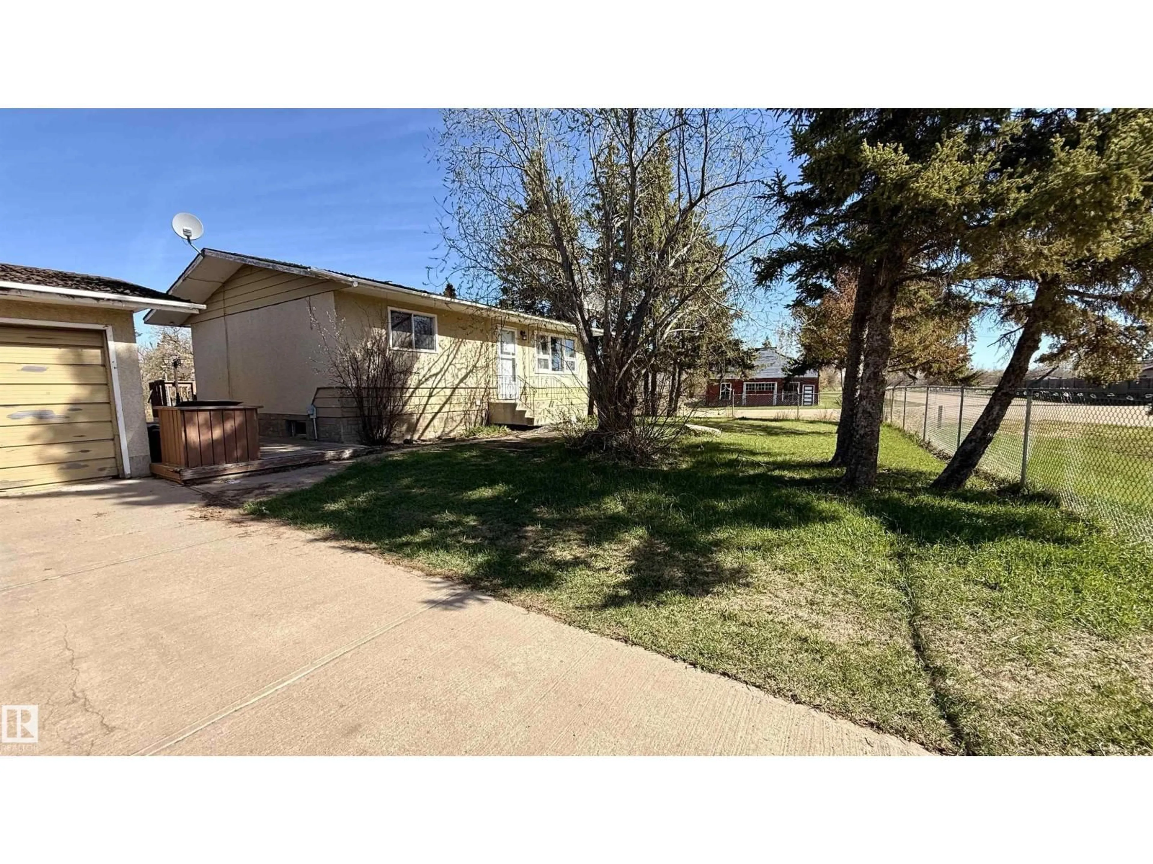 A pic from outside/outdoor area/front of a property/back of a property/a pic from drone, street for 175 - 165 540073, Rural Lamont County Alberta T0B2B0