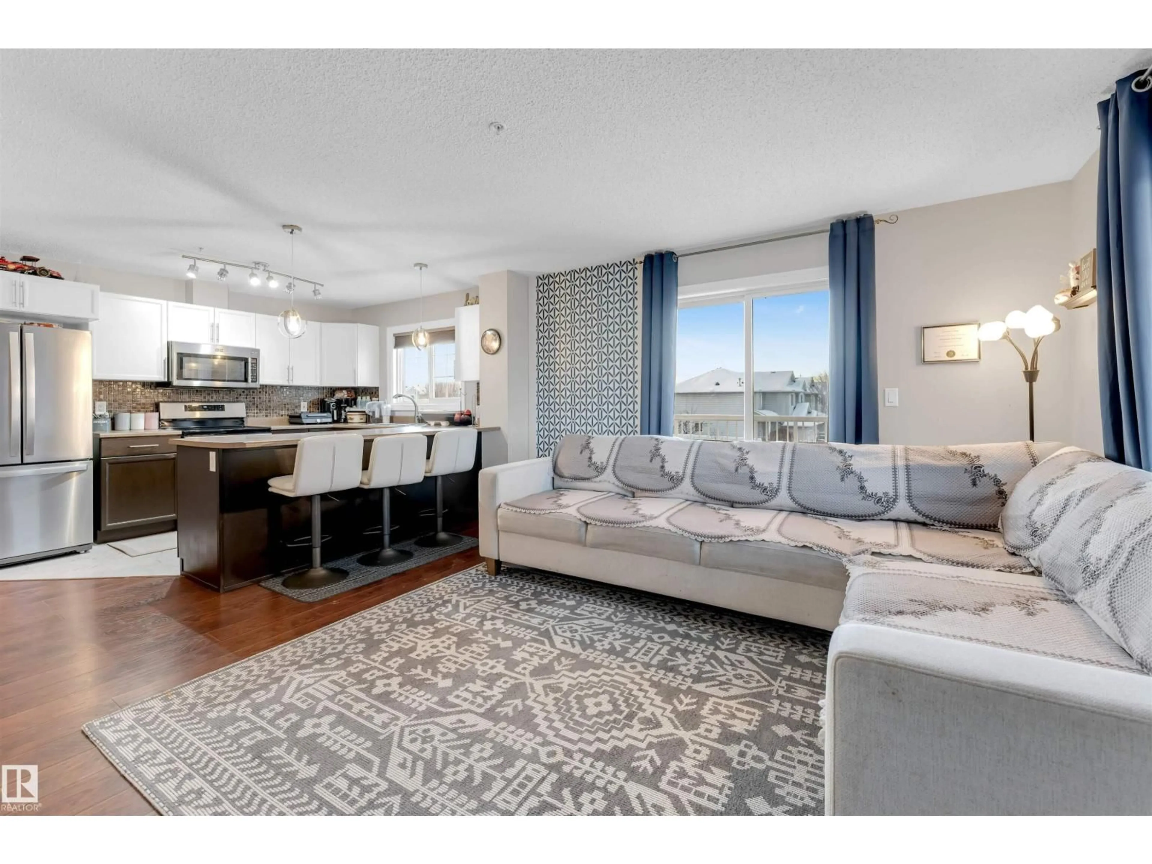 Living room with furniture, unknown for #201 - 4403 23 ST, Edmonton Alberta T6T0E4