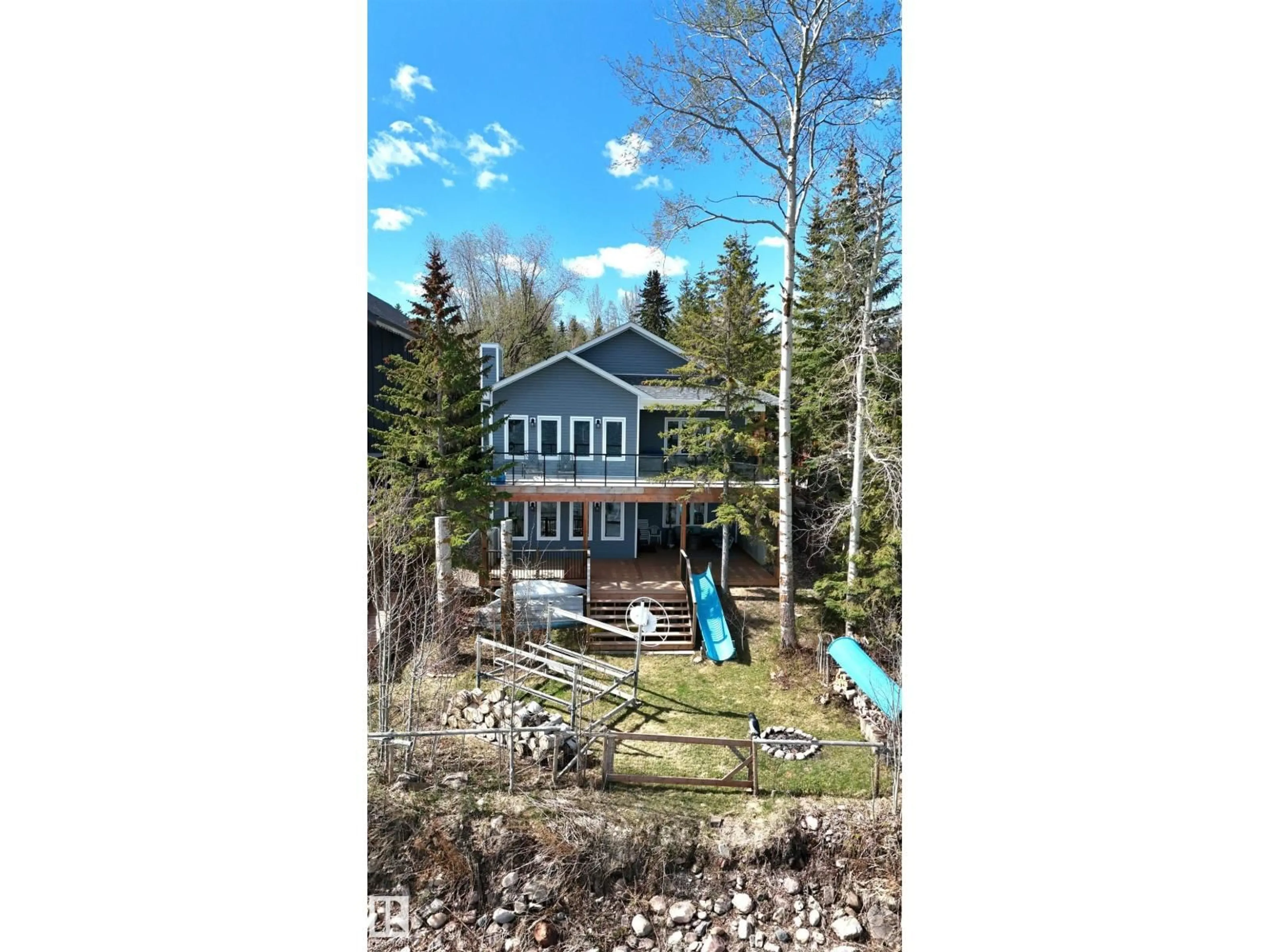 A pic from outside/outdoor area/front of a property/back of a property/a pic from drone, water/lake/river/ocean view for 45 POPLAR BA, Rural Wetaskiwin County Alberta T0C2V0
