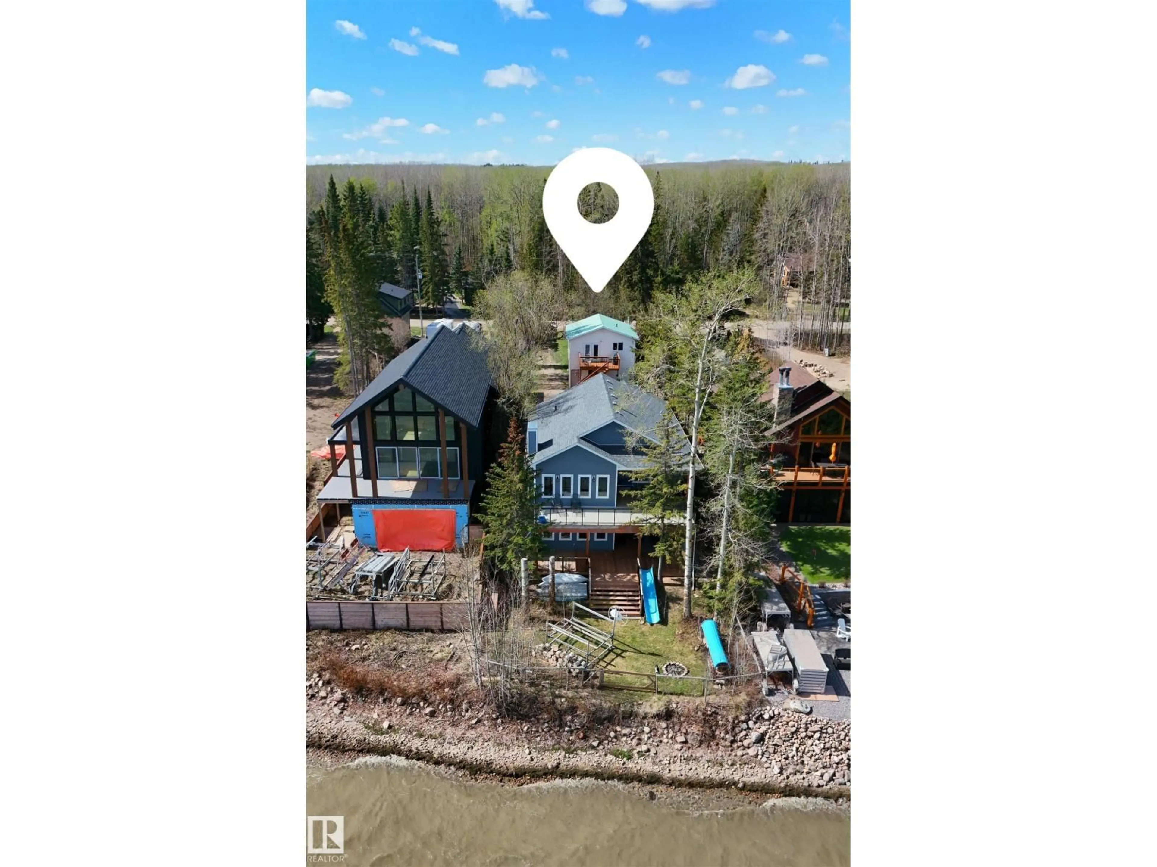 A pic from outside/outdoor area/front of a property/back of a property/a pic from drone, water/lake/river/ocean view for 45 POPLAR BA, Rural Wetaskiwin County Alberta T0C2V0