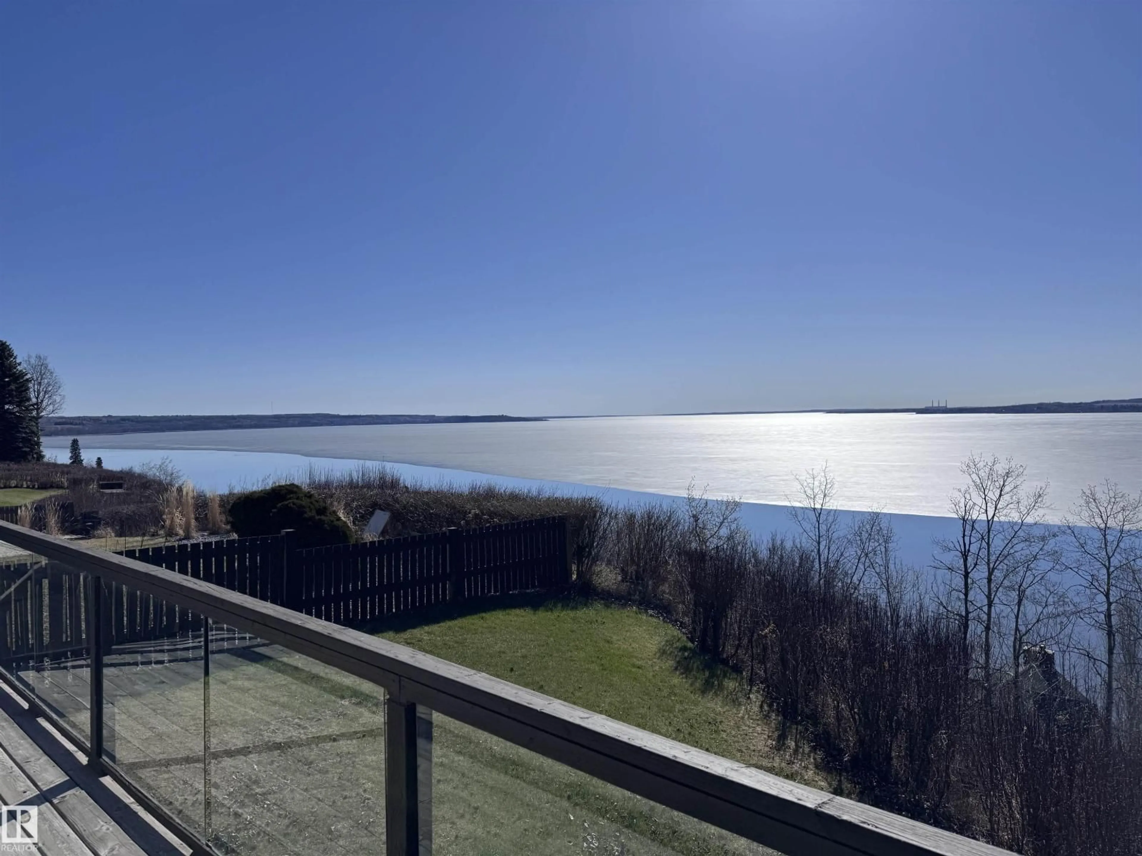 A pic from outside/outdoor area/front of a property/back of a property/a pic from drone, water/lake/river/ocean view for 53117 - 7 HWY 31, Rural Parkland County Alberta T0E2B0