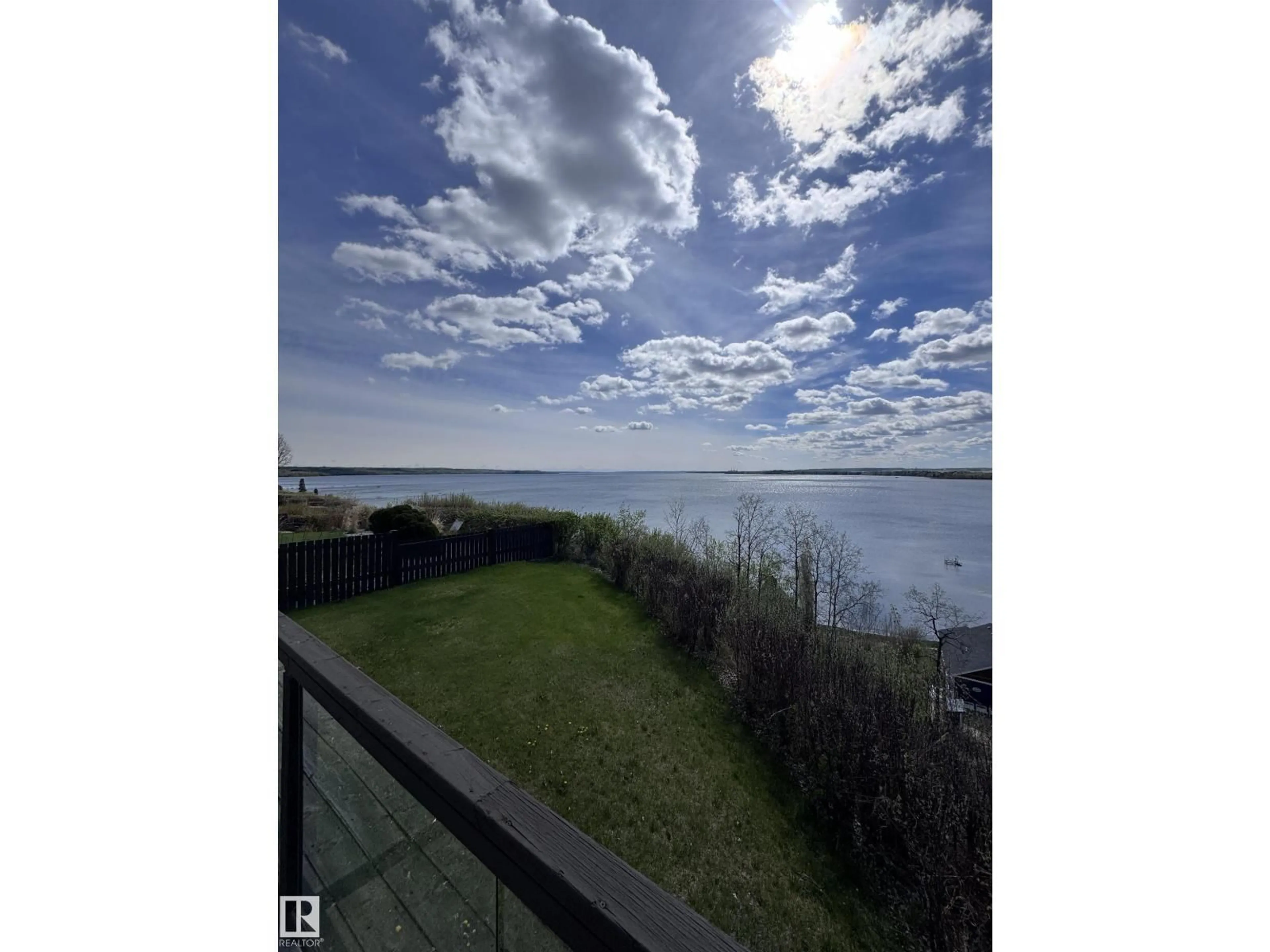 A pic from outside/outdoor area/front of a property/back of a property/a pic from drone, water/lake/river/ocean view for 53117 - 7 HWY 31, Rural Parkland County Alberta T0E2B0