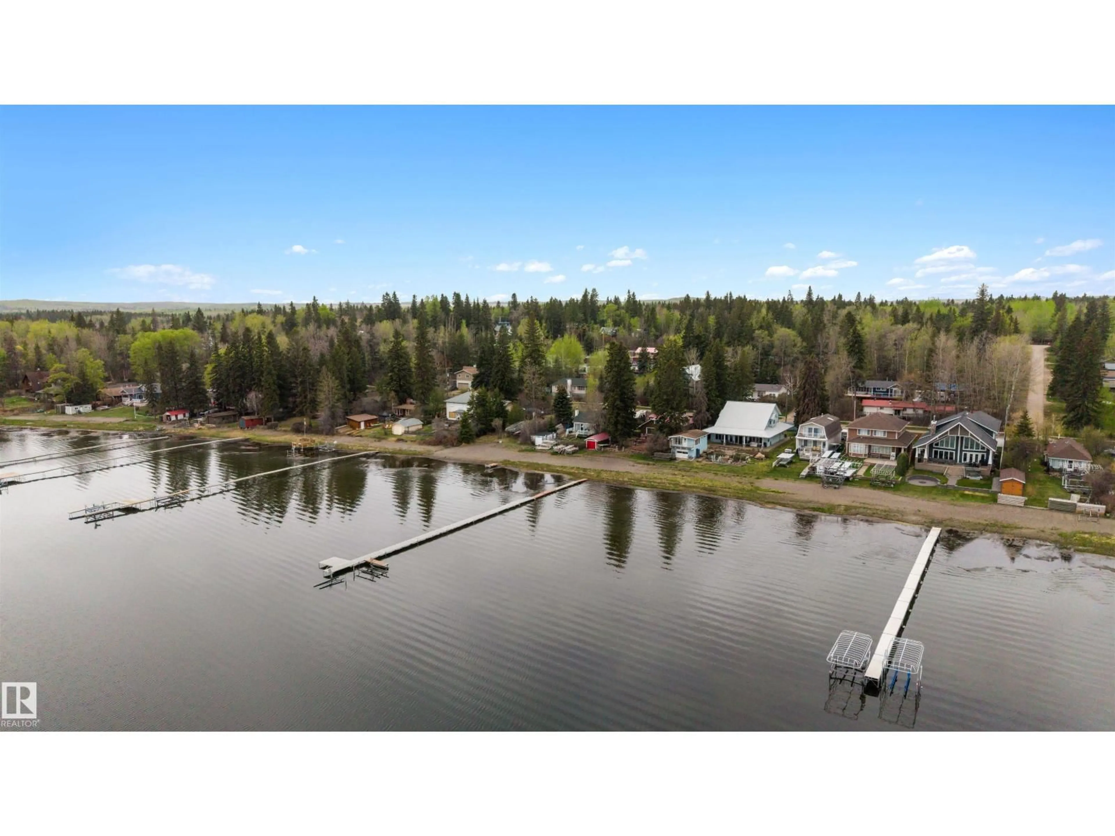 A pic from outside/outdoor area/front of a property/back of a property/a pic from drone, water/lake/river/ocean view for 621 1 AV S, Rural Parkland County Alberta T0E2B0