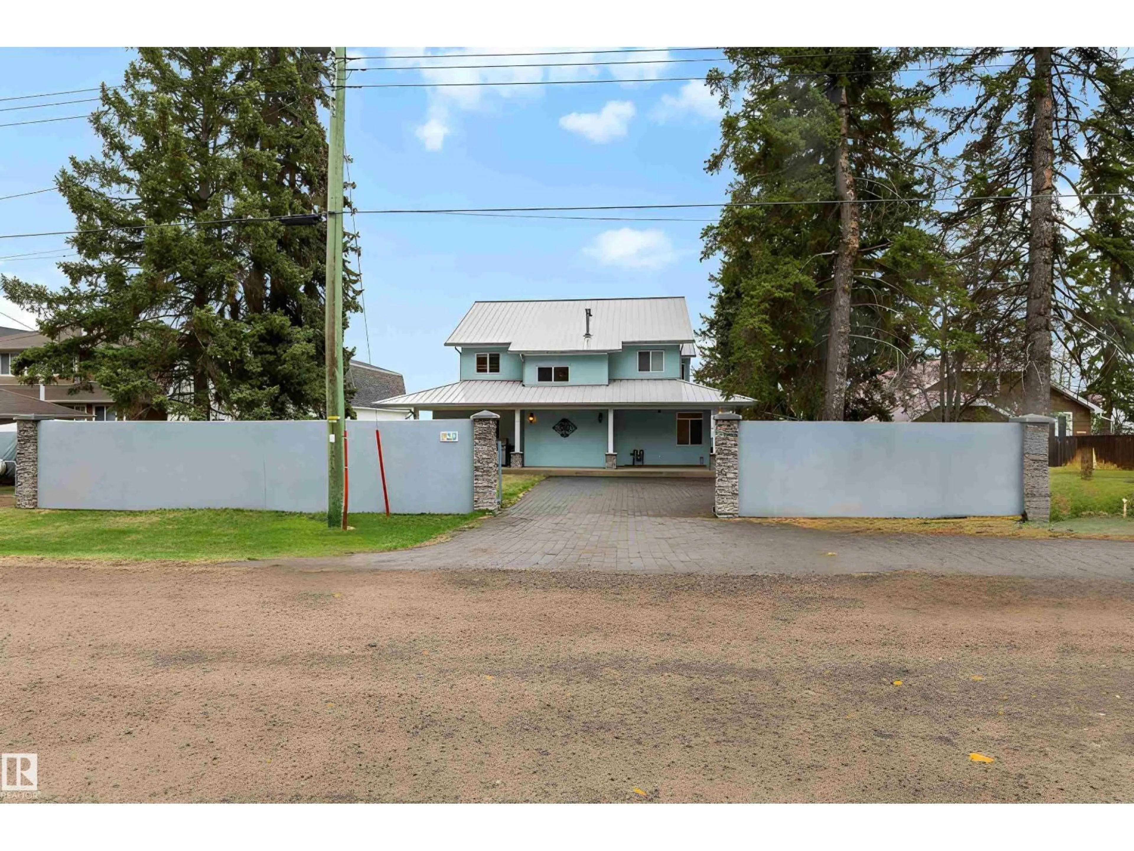 A pic from outside/outdoor area/front of a property/back of a property/a pic from drone, street for 621 1 AV S, Rural Parkland County Alberta T0E2B0