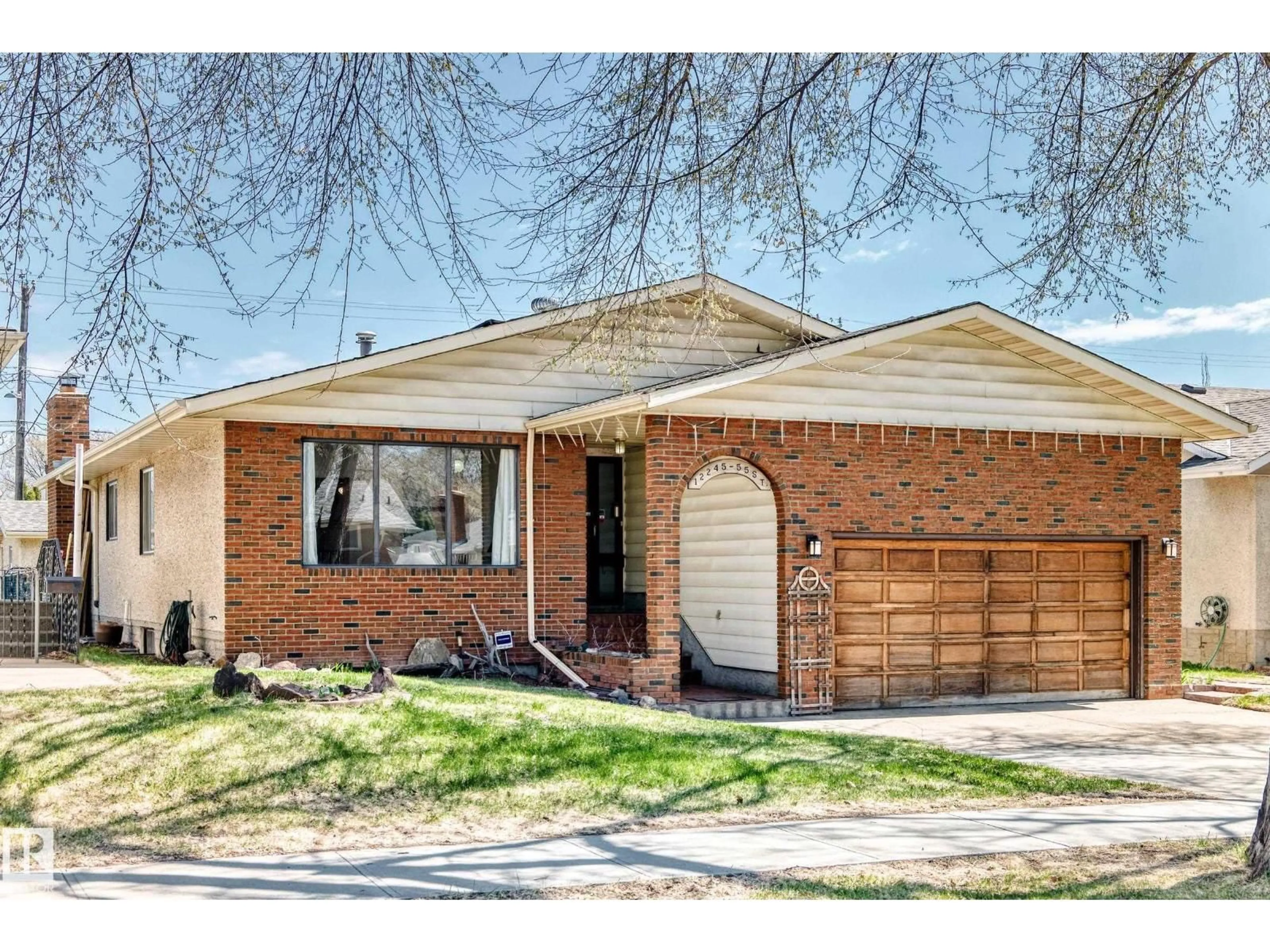 Home with brick exterior material, street for NW - 12245 55 ST, Edmonton Alberta T5W3R5