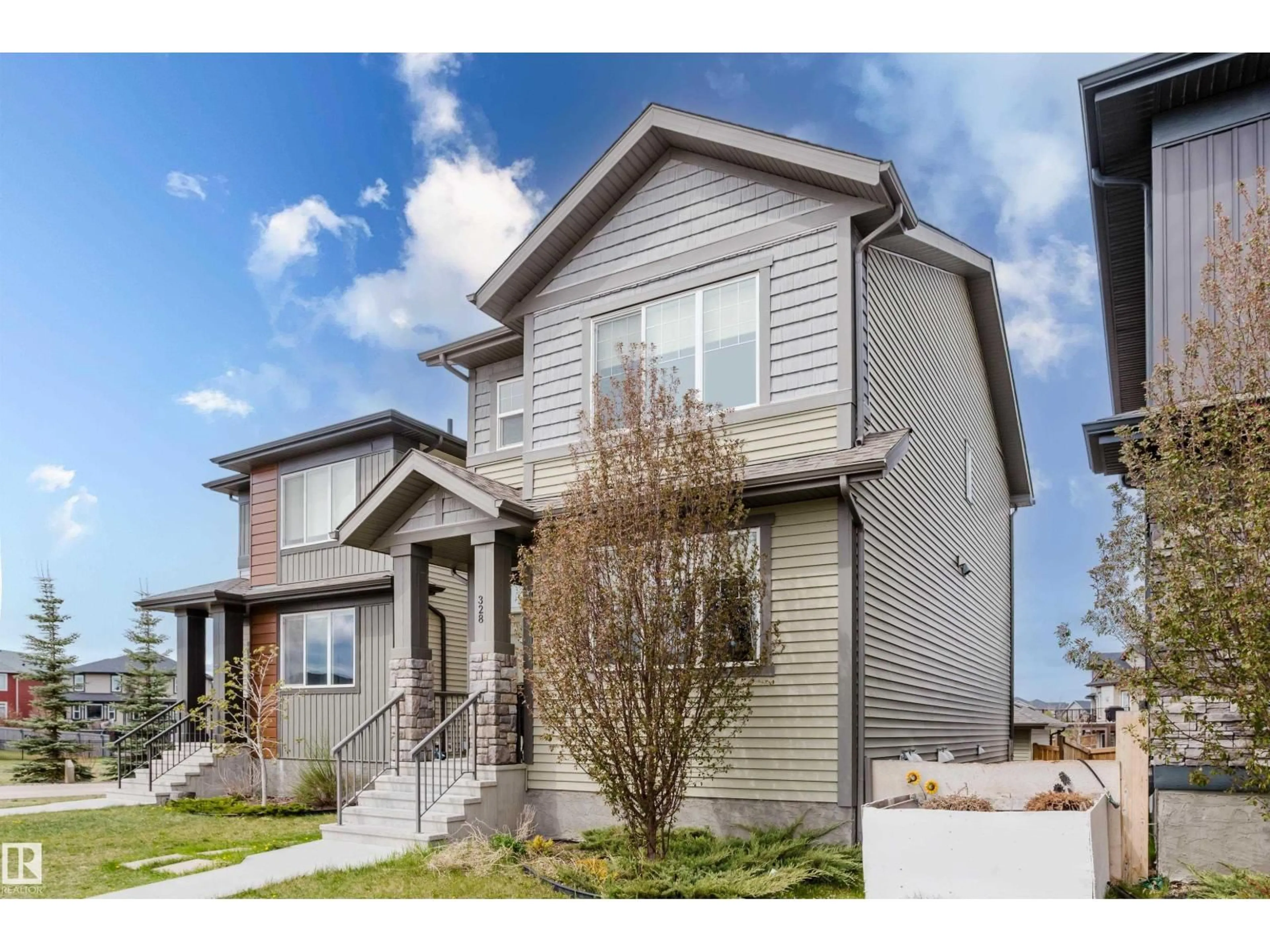 Home with vinyl exterior material, street for 328 WEST HAVEN DR, Leduc Alberta T9E0J2