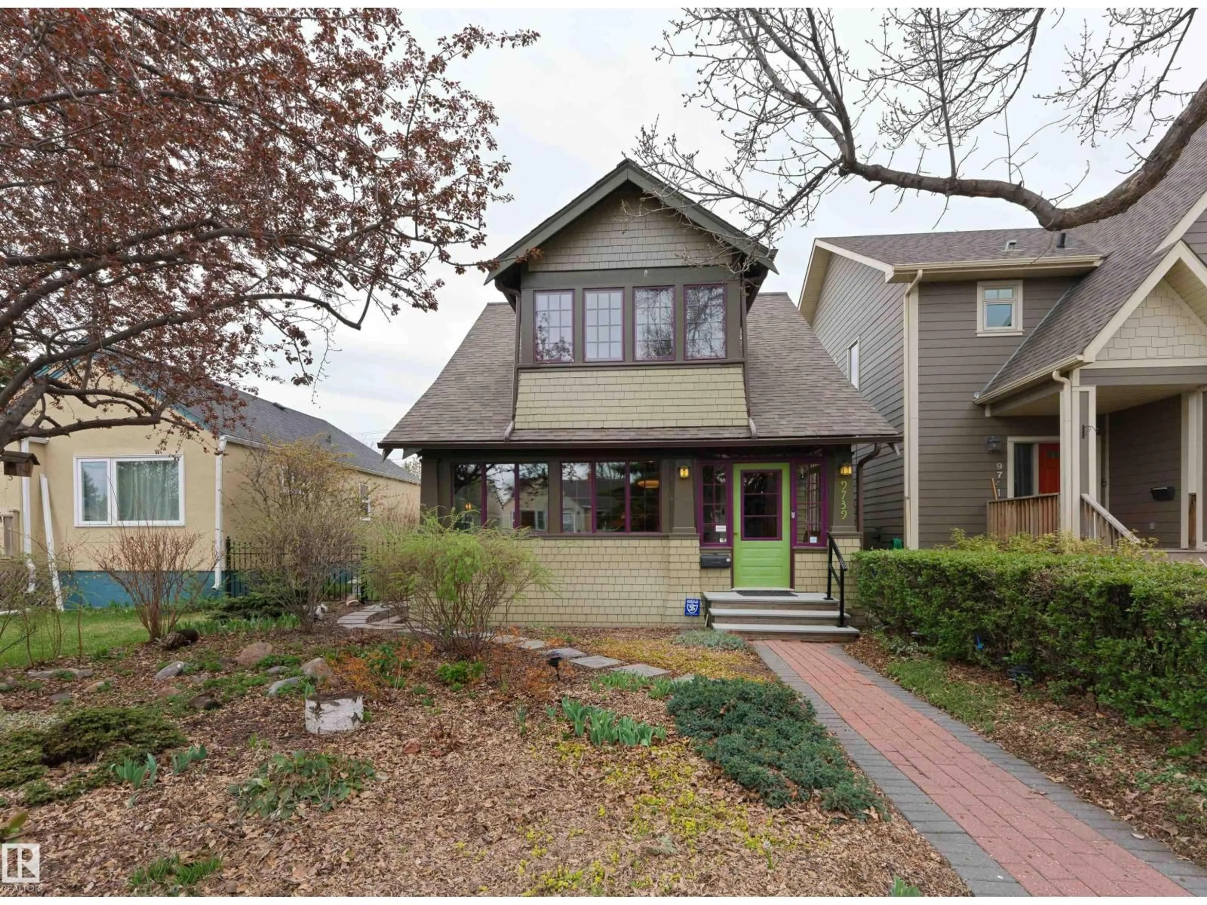 Home with brick exterior material, street for 9739 86 AV, Edmonton Alberta T6E2L3