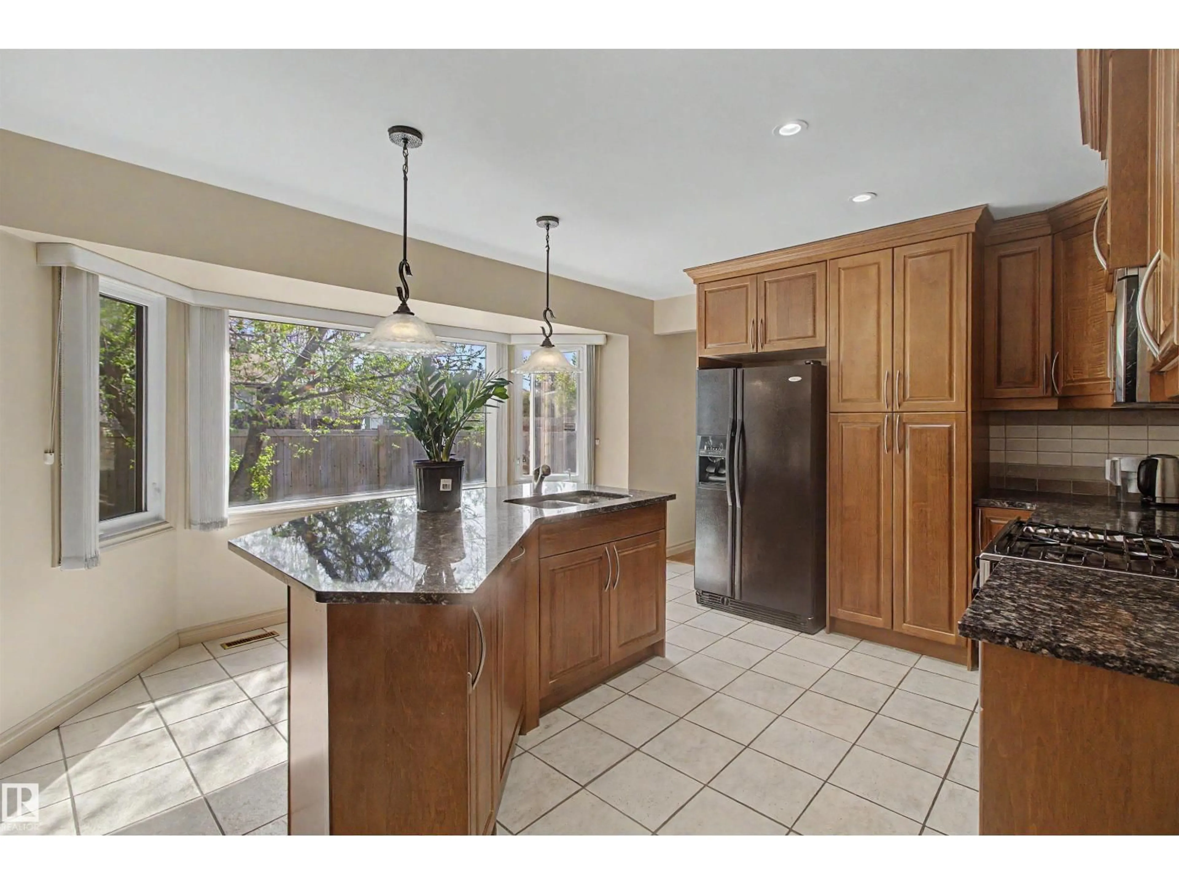 Open concept kitchen, ceramic/tile floor for 11617 26 AV, Edmonton Alberta T6J3R3