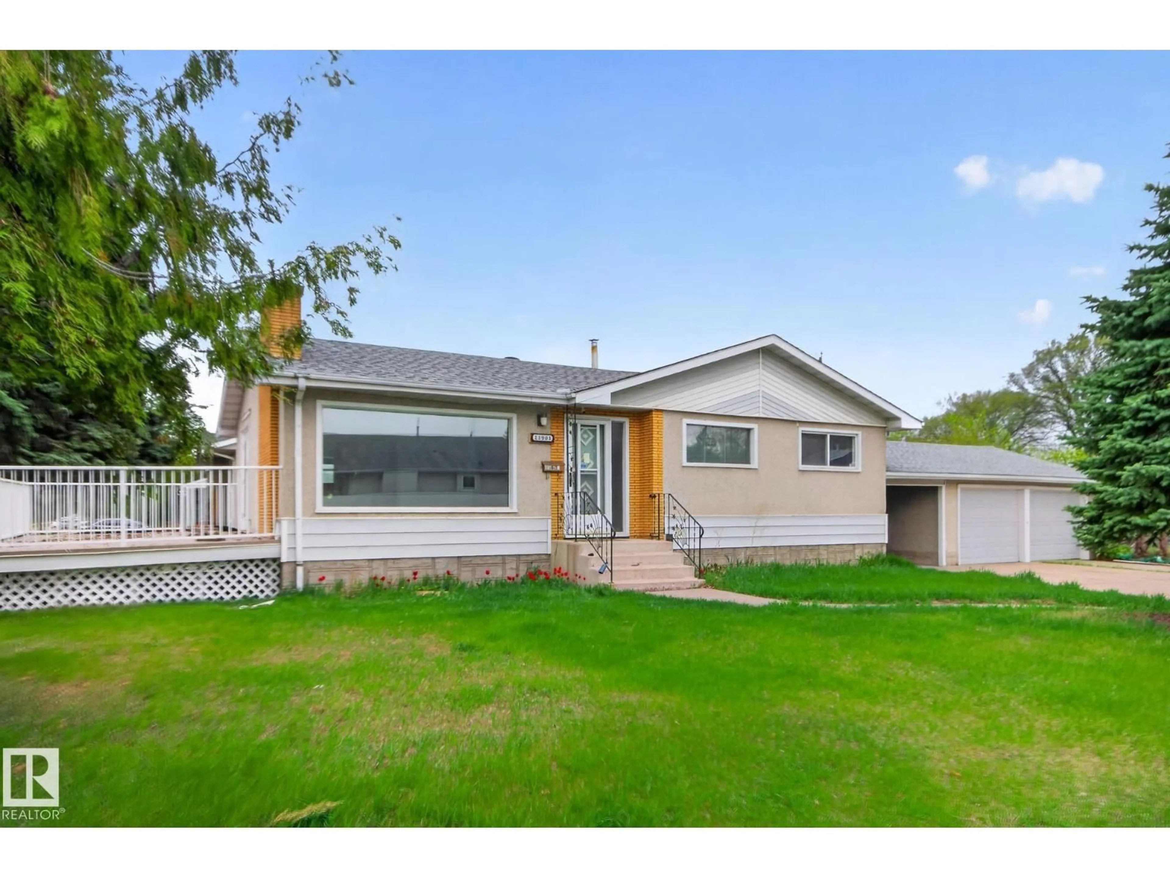Home with vinyl exterior material, street for 11901 42 ST, Edmonton Alberta T5W2N5
